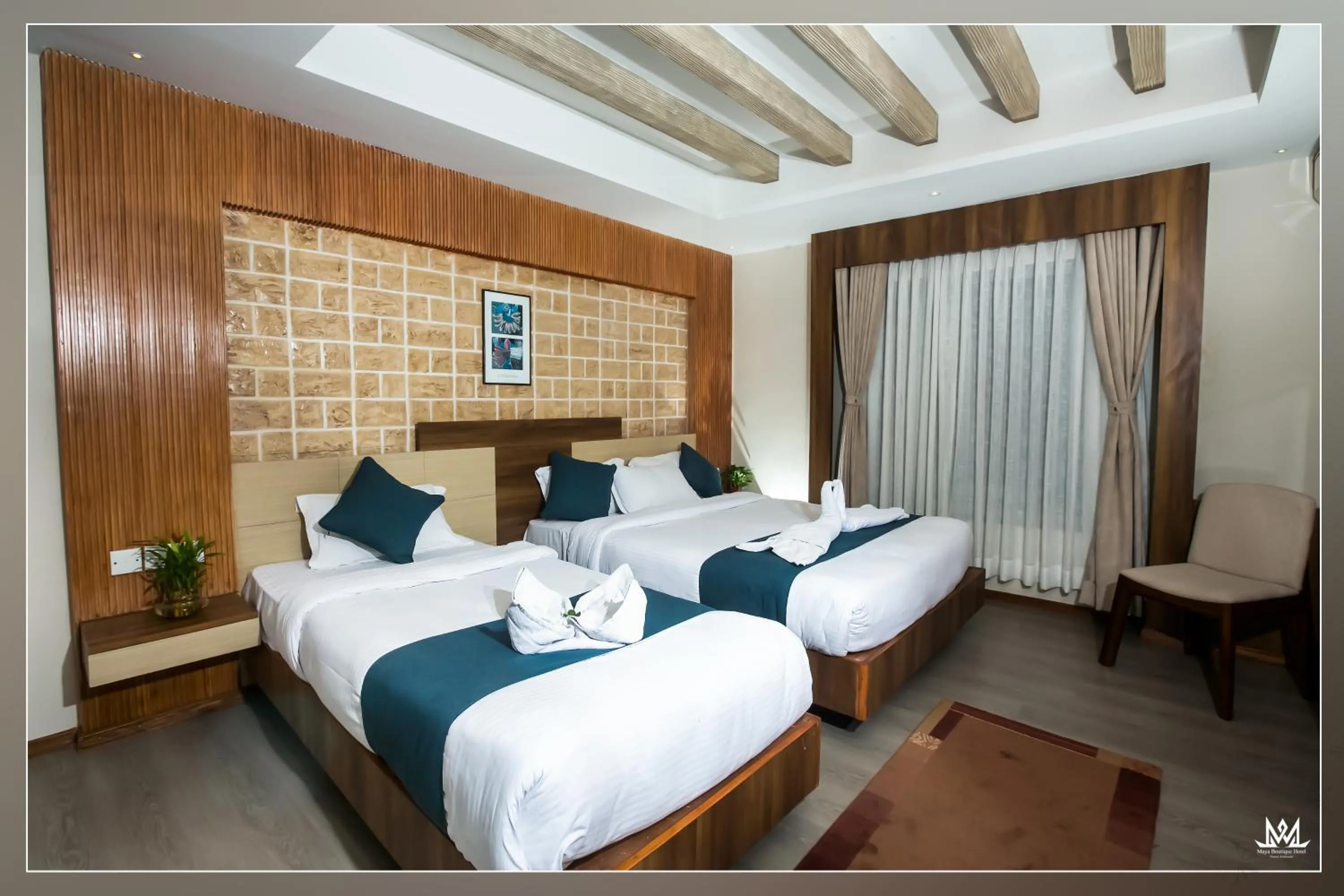 Bed in Maya Boutique Hotel