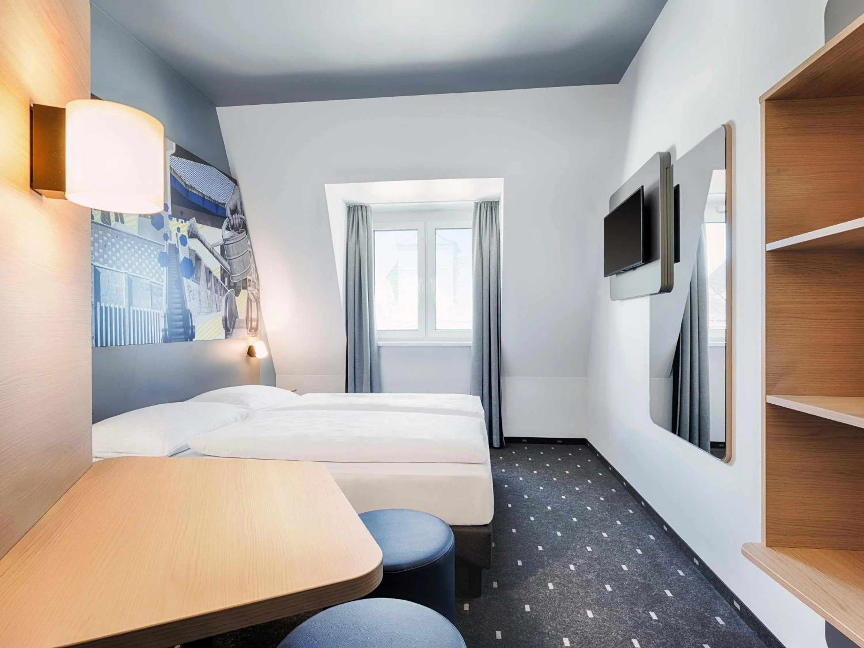 Photo of the whole room, Bed in B&B HOTEL Gießen-City