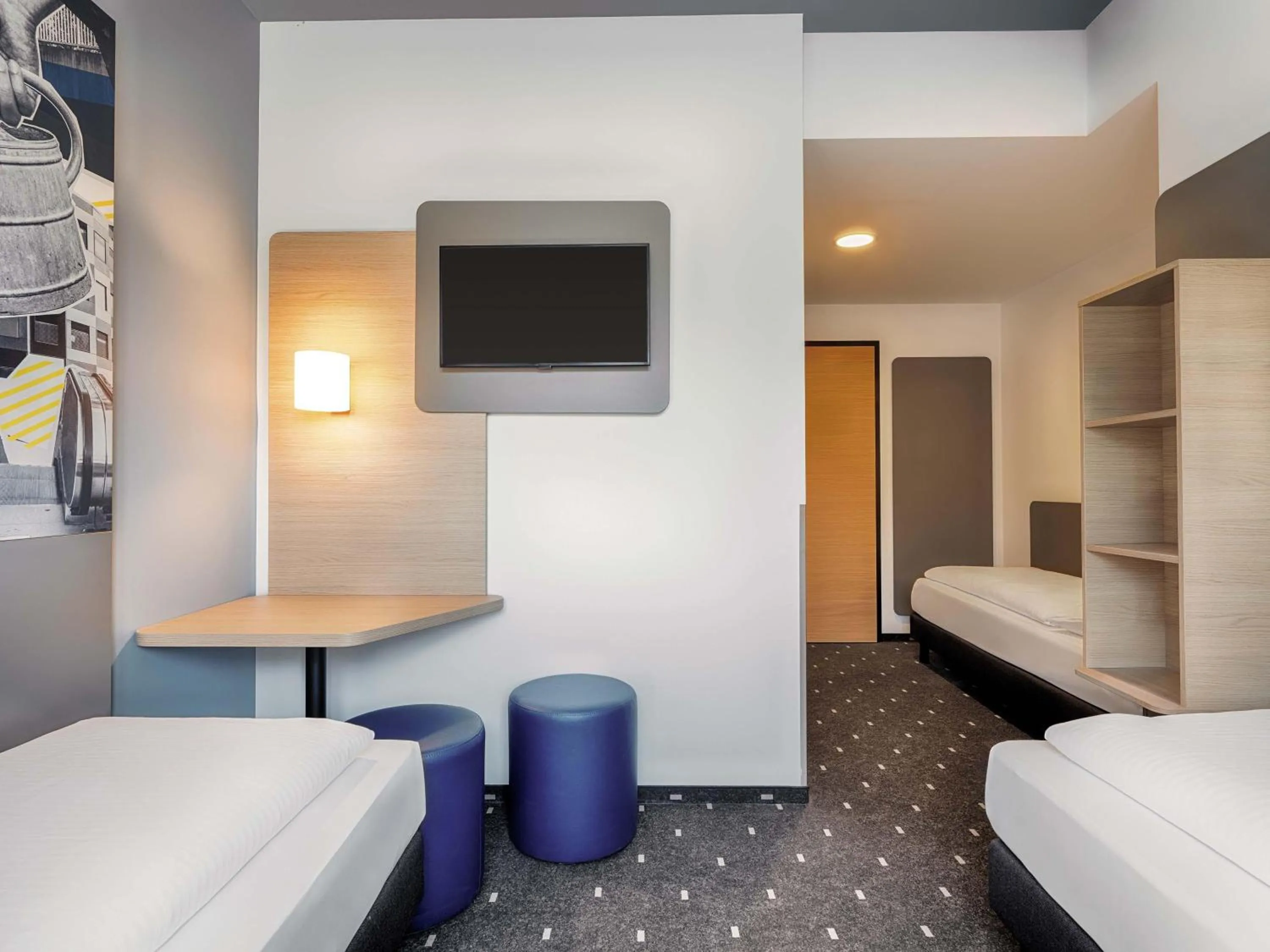 Photo of the whole room, Bed in B&B HOTEL Gießen-City