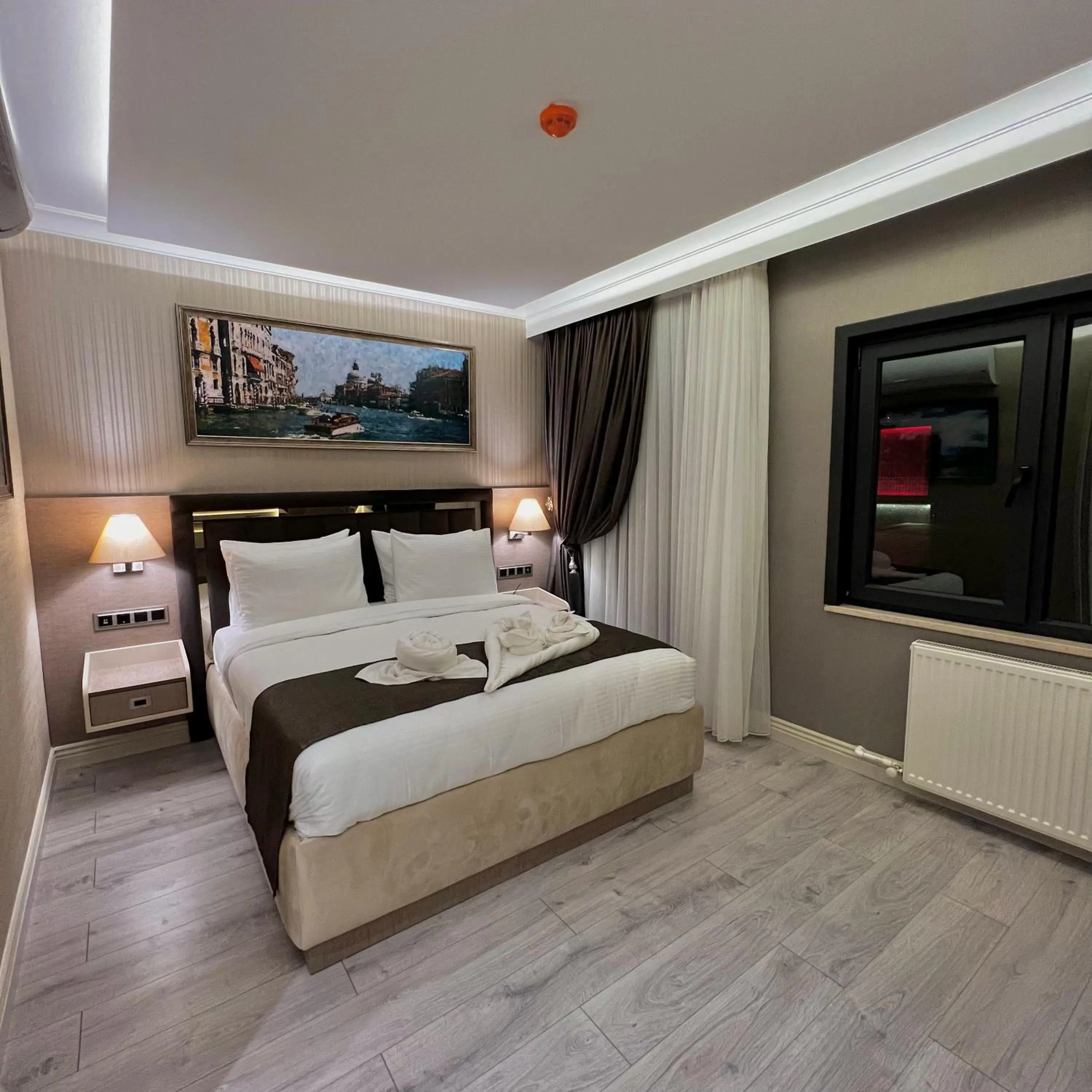Bed in MQ Hotel Suites & SPA