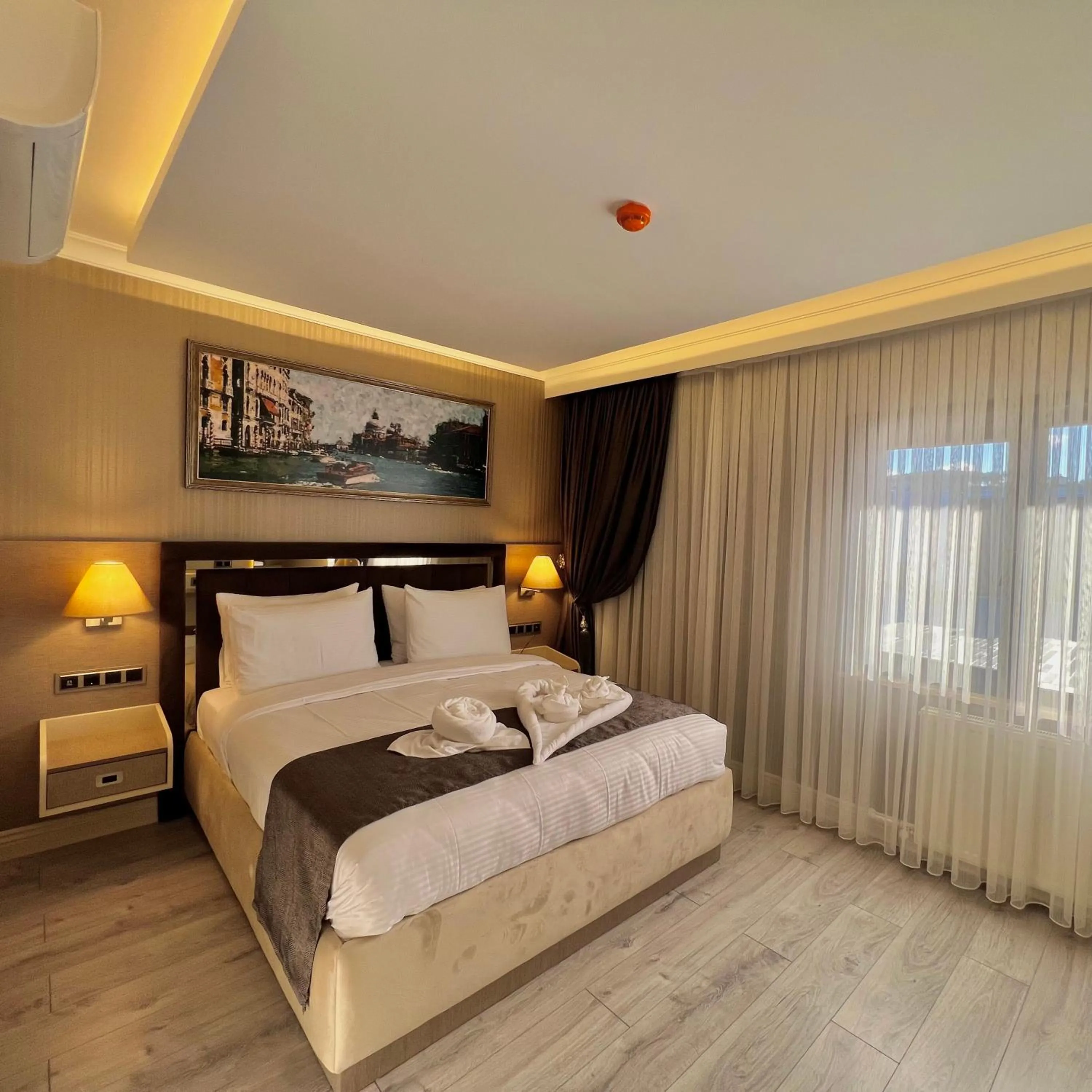 Bed in MQ Hotel Suites & SPA