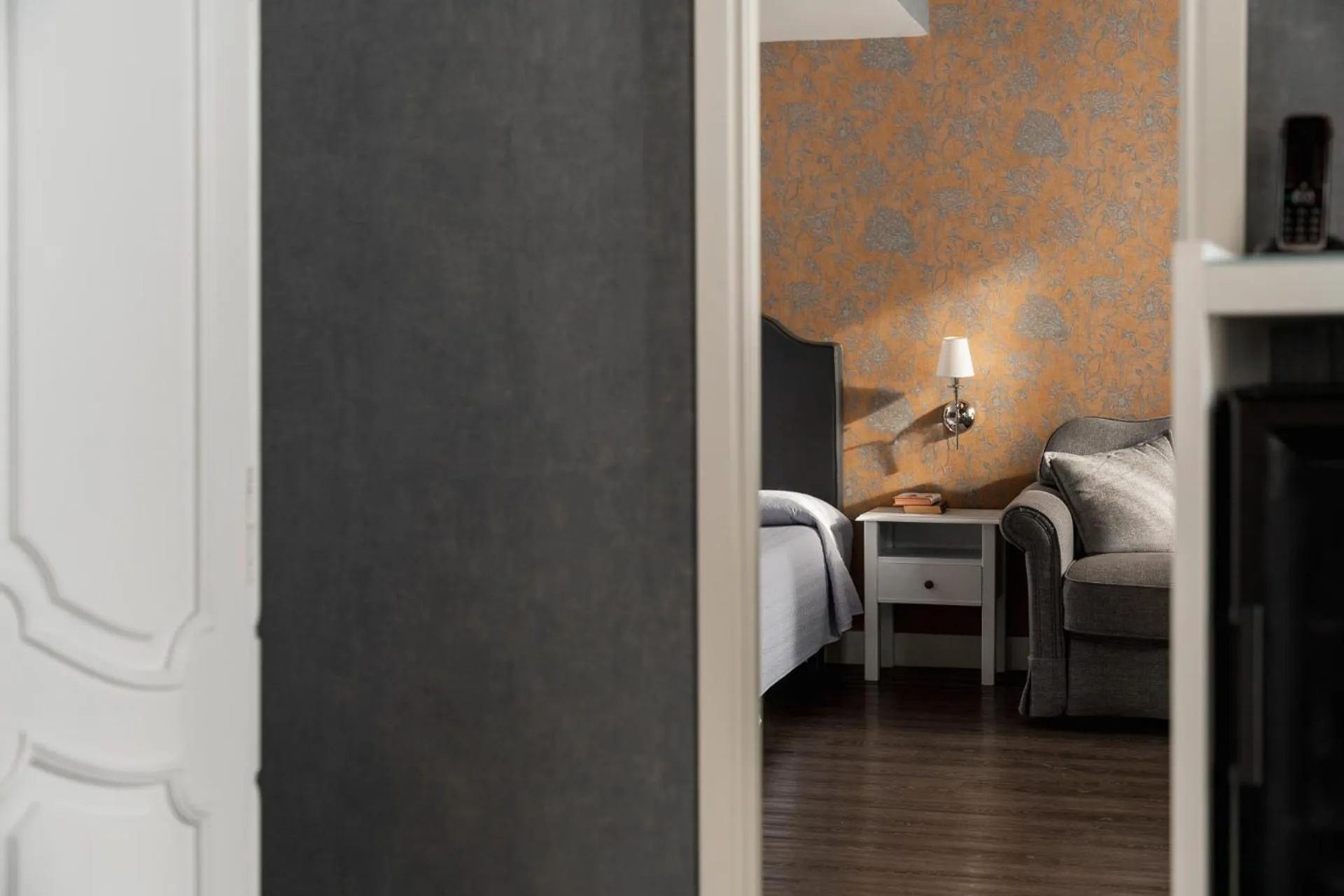 Bed in Maxxim Hotel & Loft