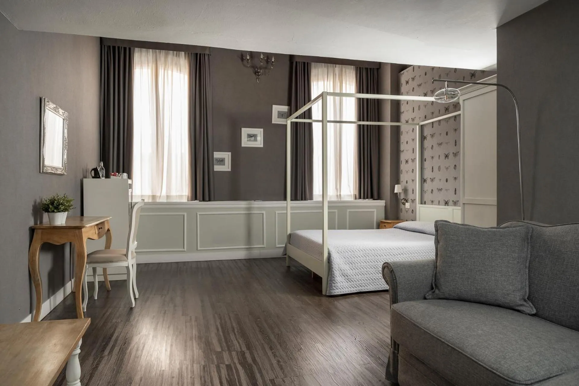 Bed in Maxxim Hotel & Loft