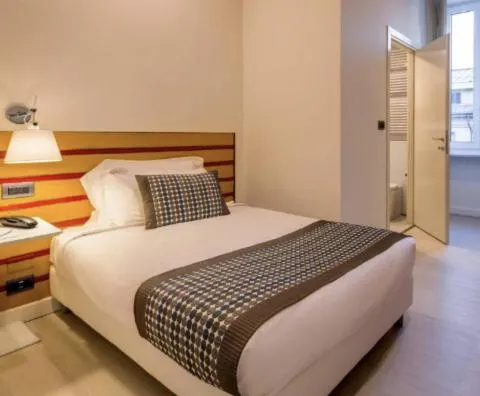 Bed in Best Western Plus Royal Superga Hotel