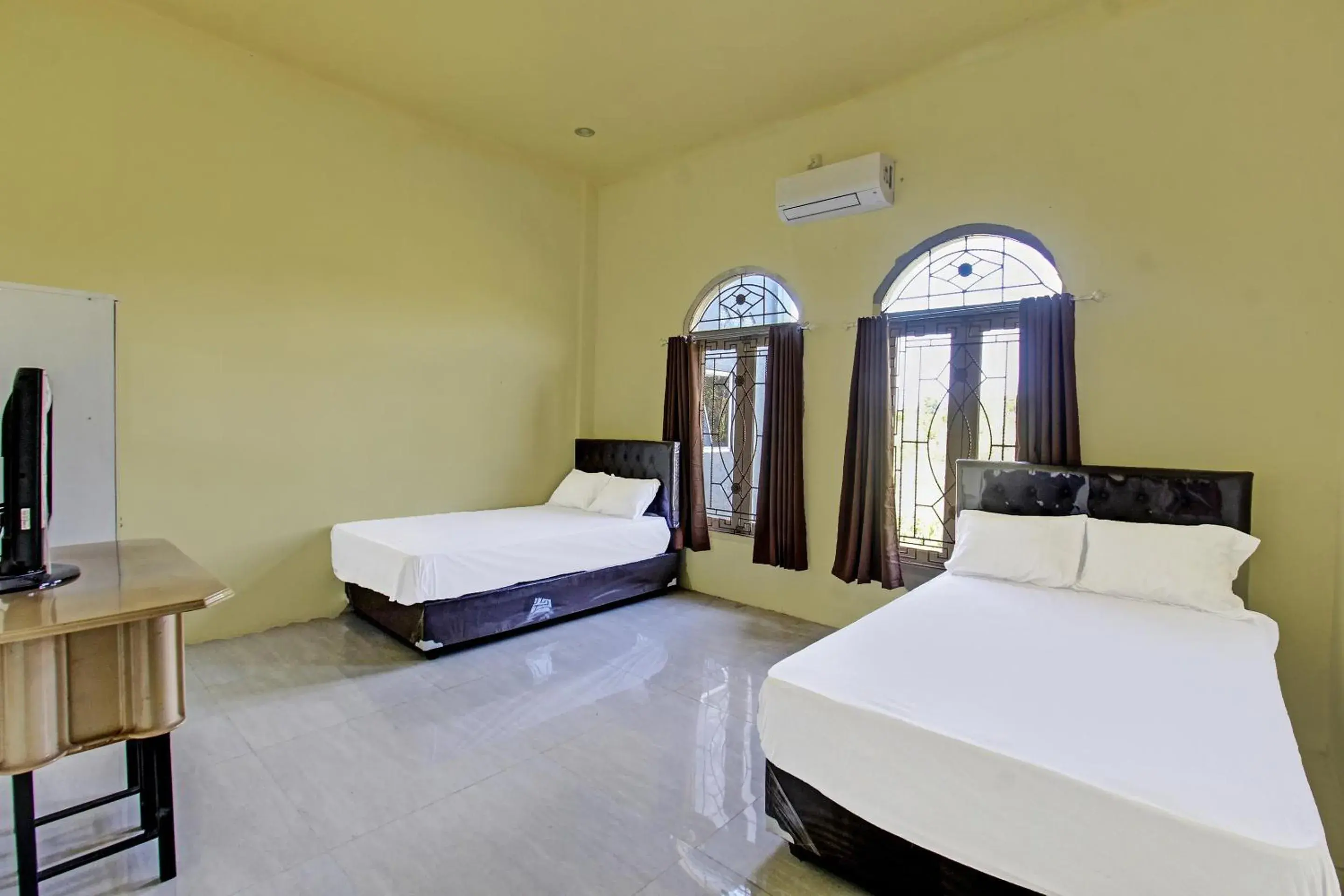 Bedroom, Bed in Hotel O Ayu Bypass MansionNearBundaran Gerung Bedroom, Bed in Hotel O Ayu Bypass MansionNearBundaran Gerung