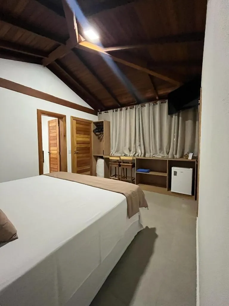 Bed in Pousada Mar Mineiro Macacos