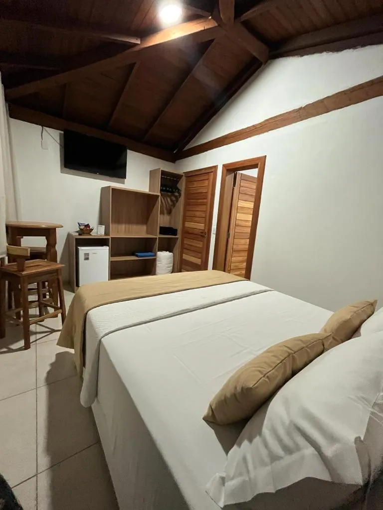 Bed in Pousada Mar Mineiro Macacos