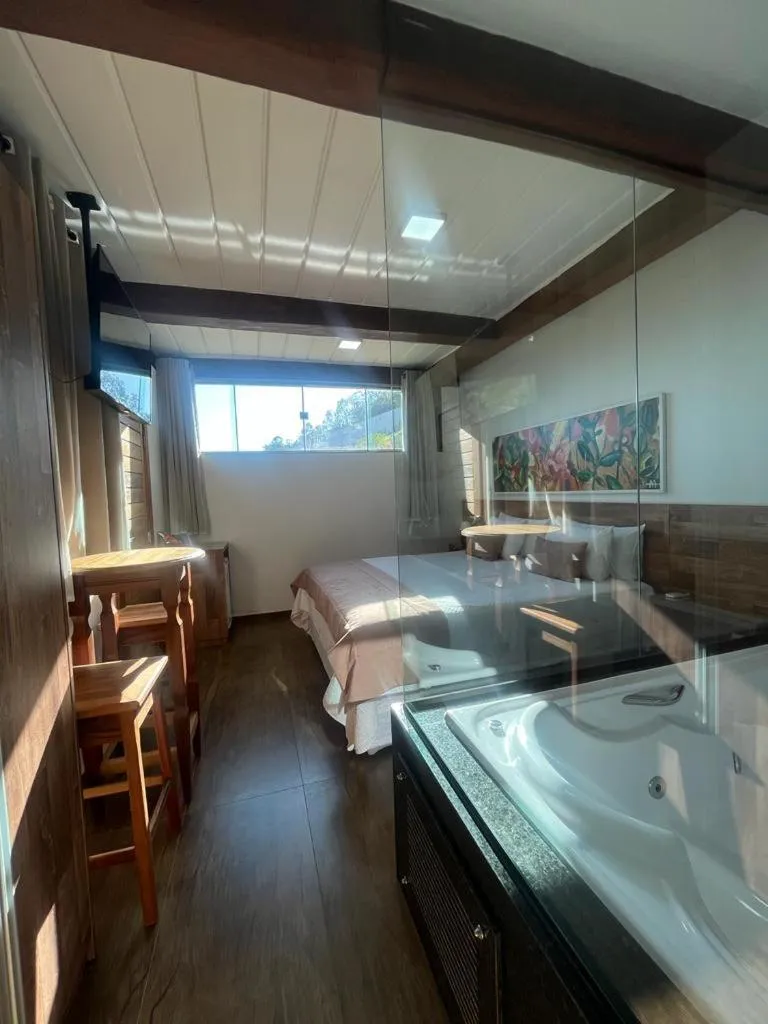 Bed in Pousada Mar Mineiro Macacos