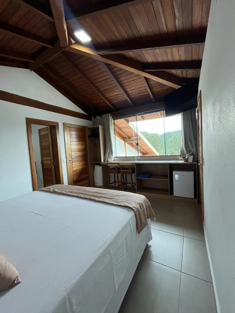 Bed in Pousada Mar Mineiro Macacos