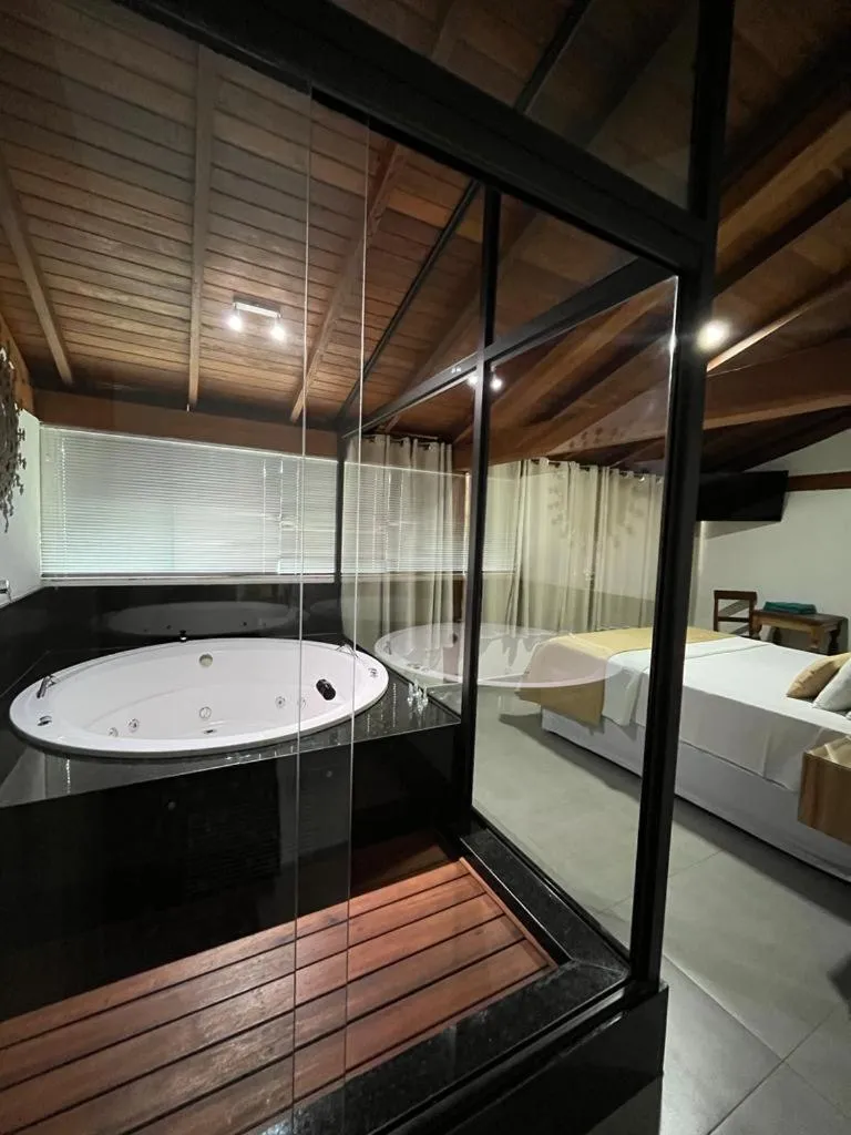 Bed in Pousada Mar Mineiro Macacos