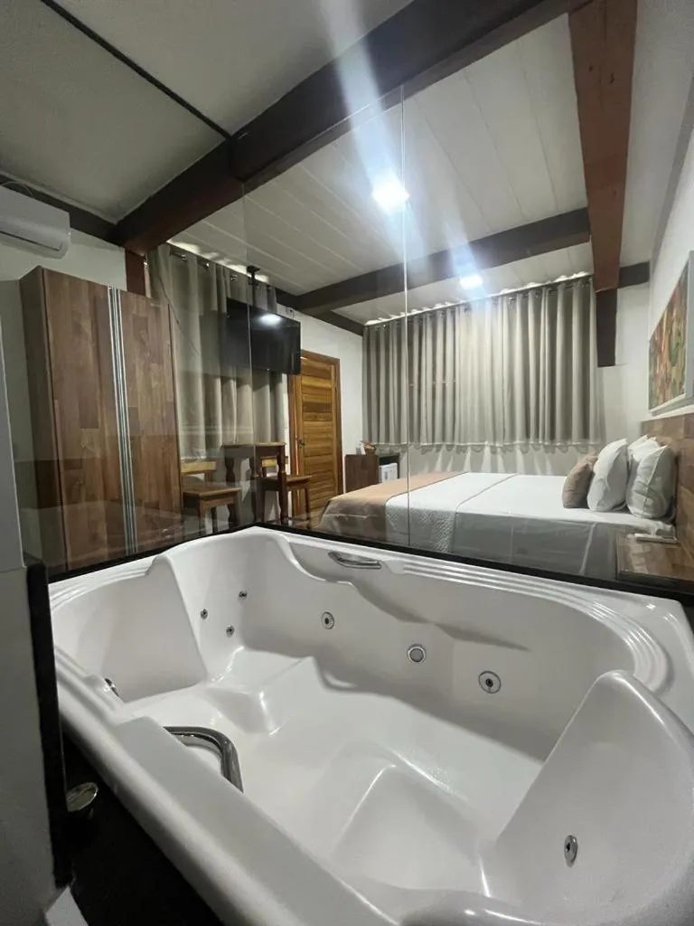 Bed in Pousada Mar Mineiro Macacos