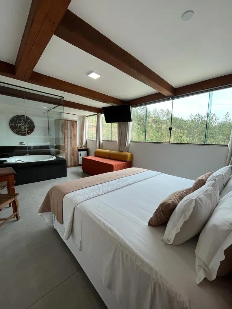 Bed in Pousada Mar Mineiro Macacos