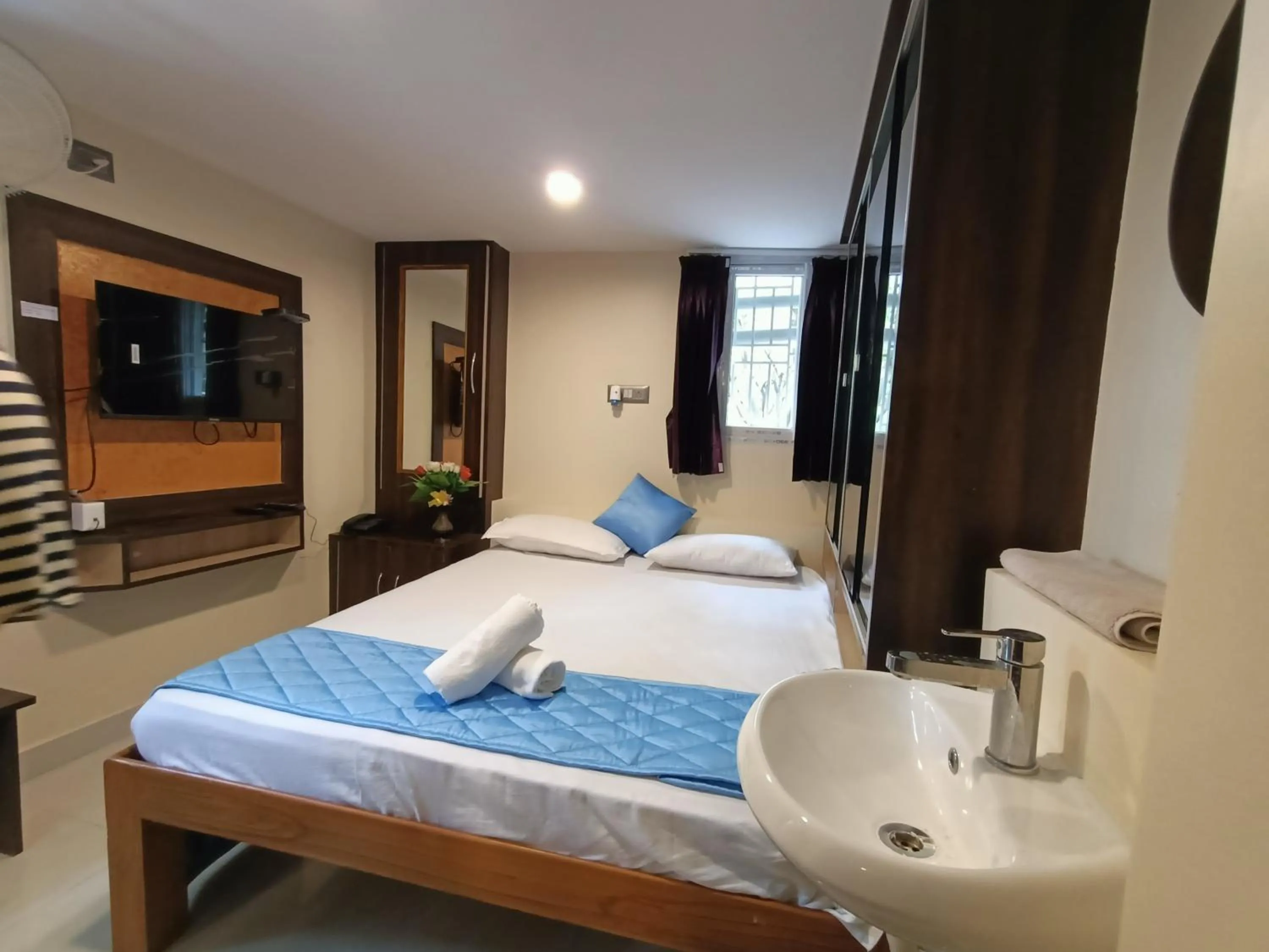 Photo of the whole room, Bed in Bhavan Resorts