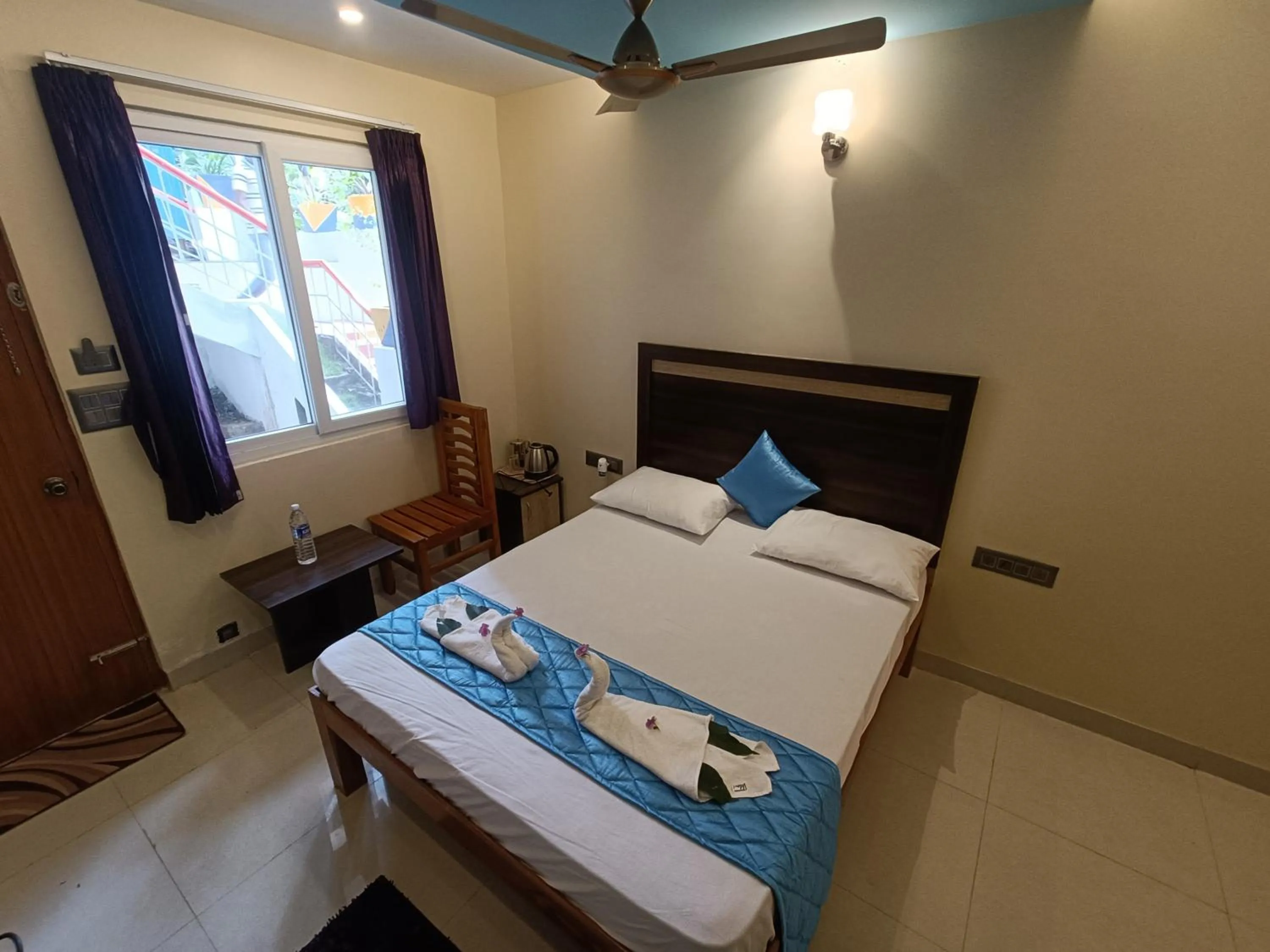 Bed in Bhavan Resorts