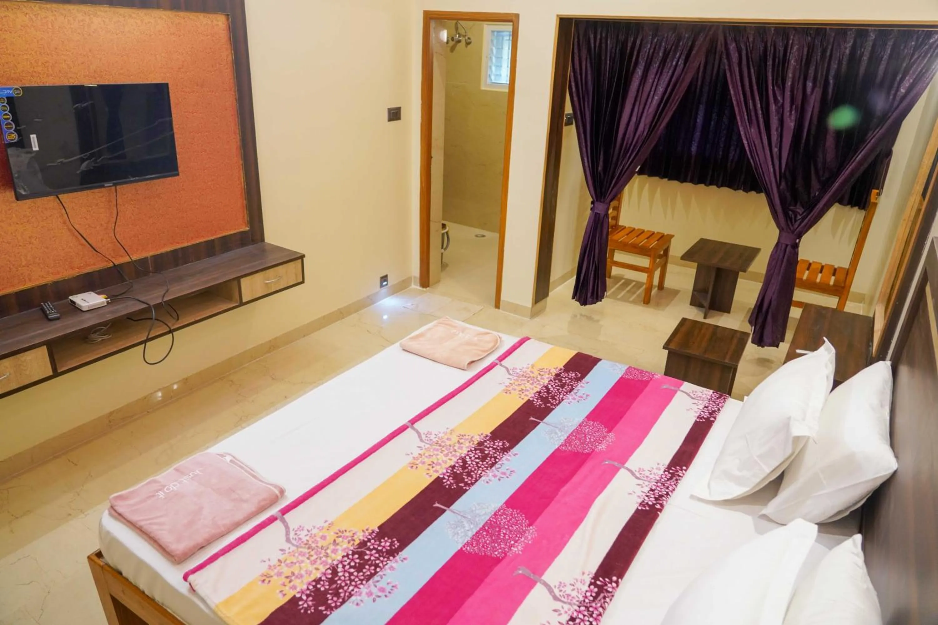 Bed in Bhavan Resorts