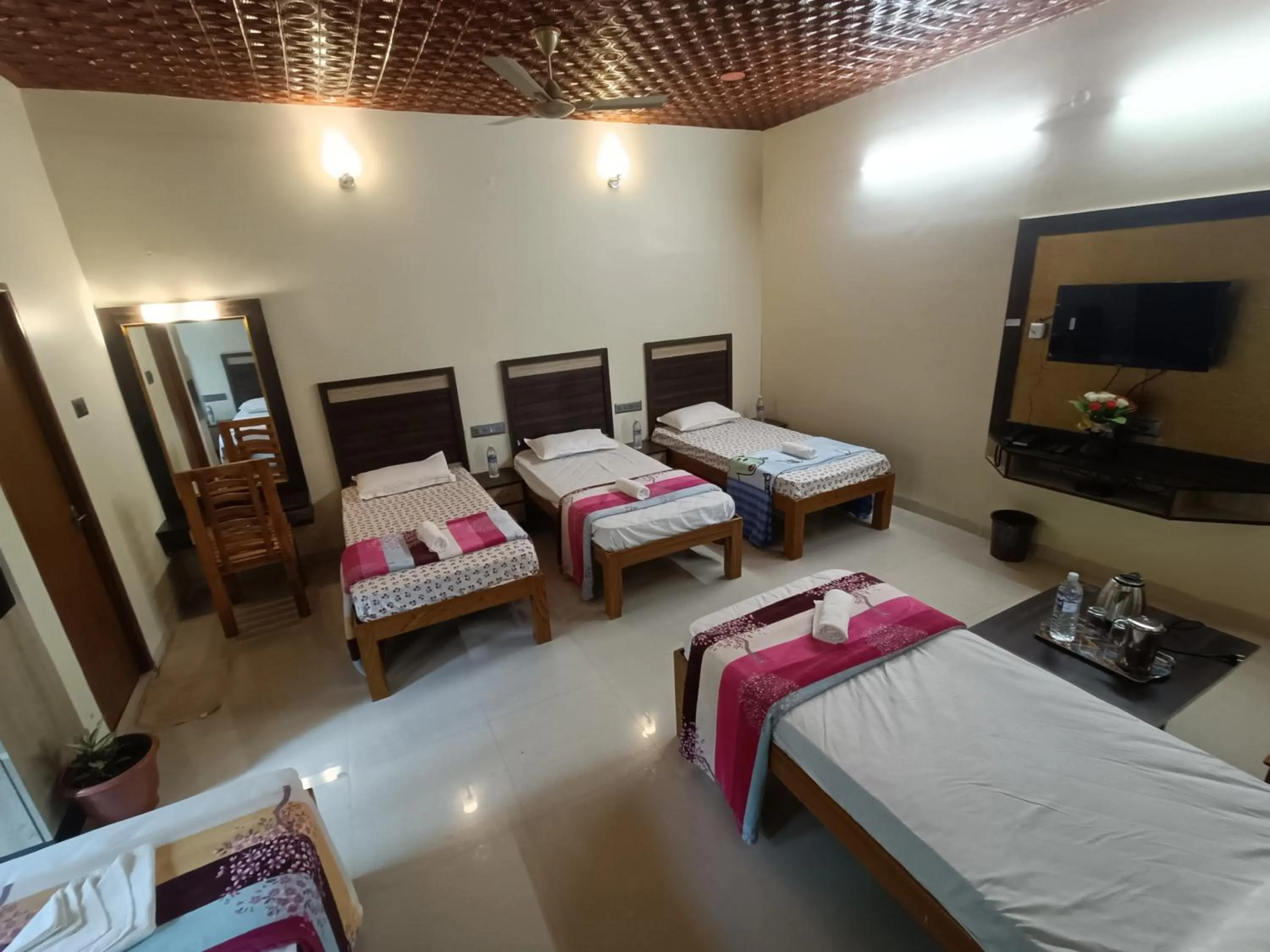 Photo of the whole room, Bed in Bhavan Resorts