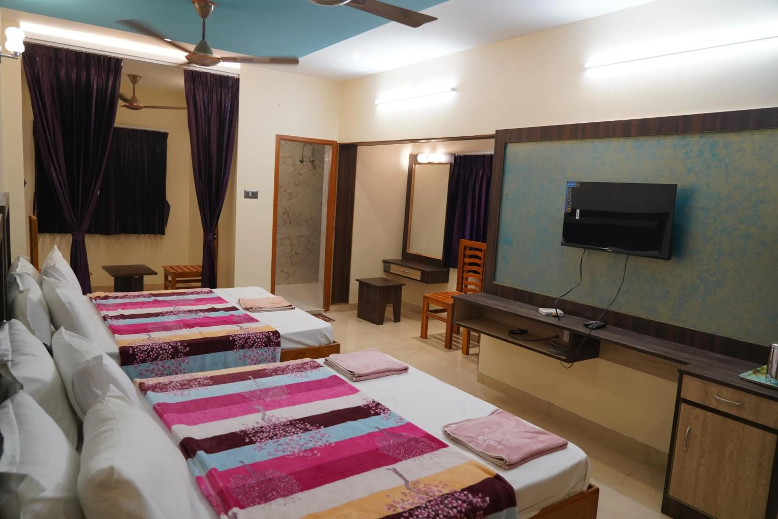 Bed in Bhavan Resorts