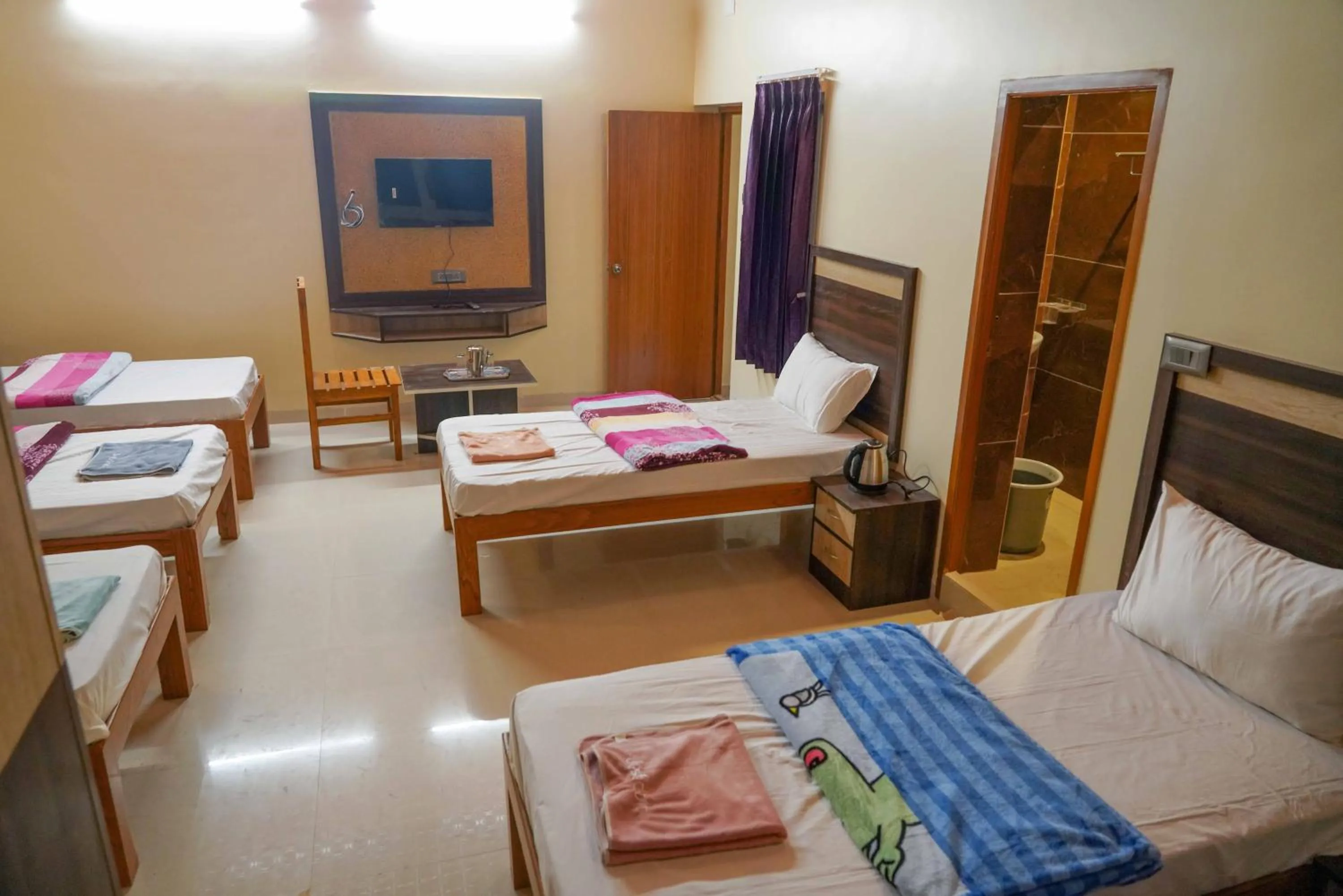 Bed in Bhavan Resorts