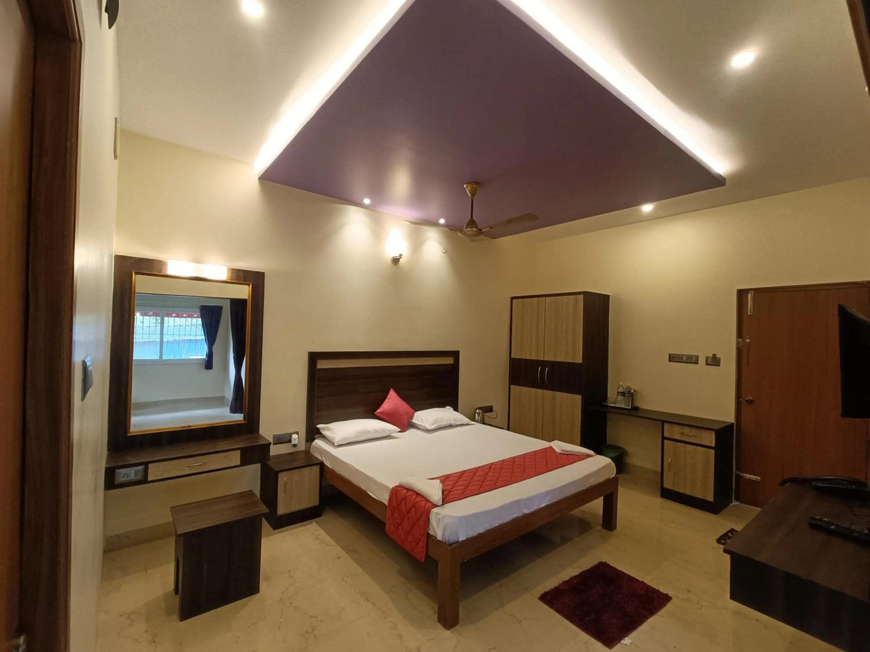 Photo of the whole room, Bed in Bhavan Resorts