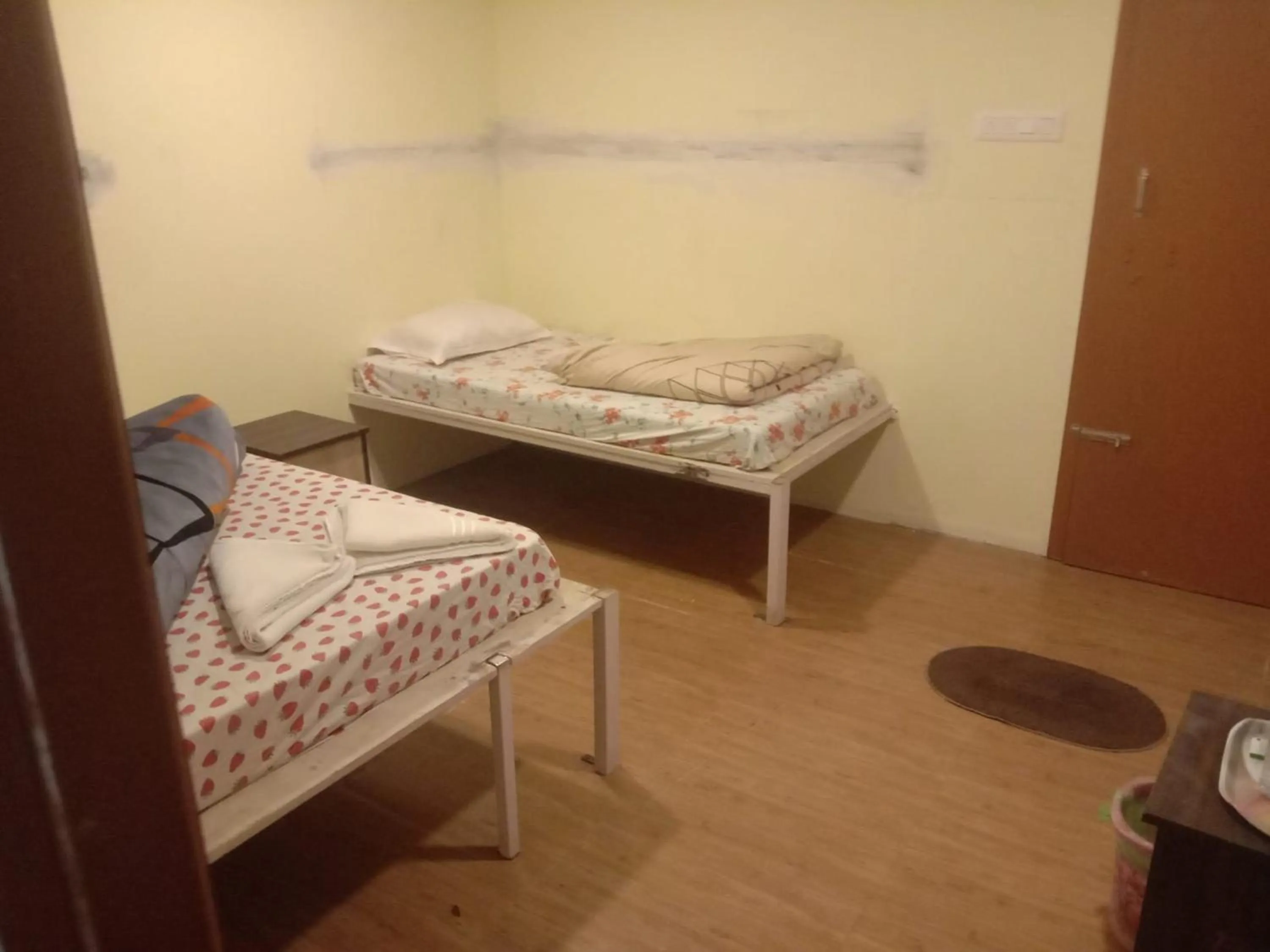 Bed in Bhavan Resorts