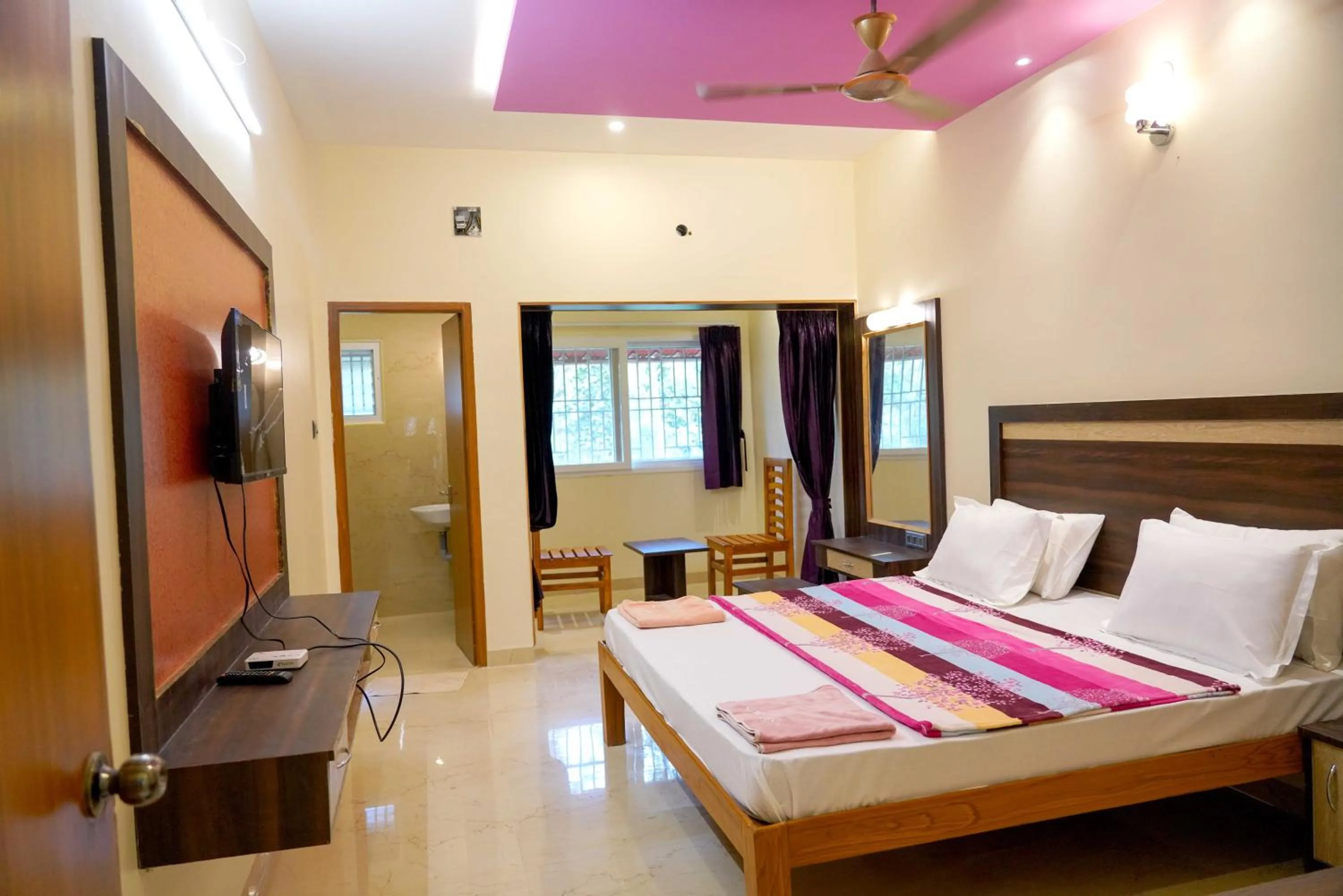 Bed in Bhavan Resorts