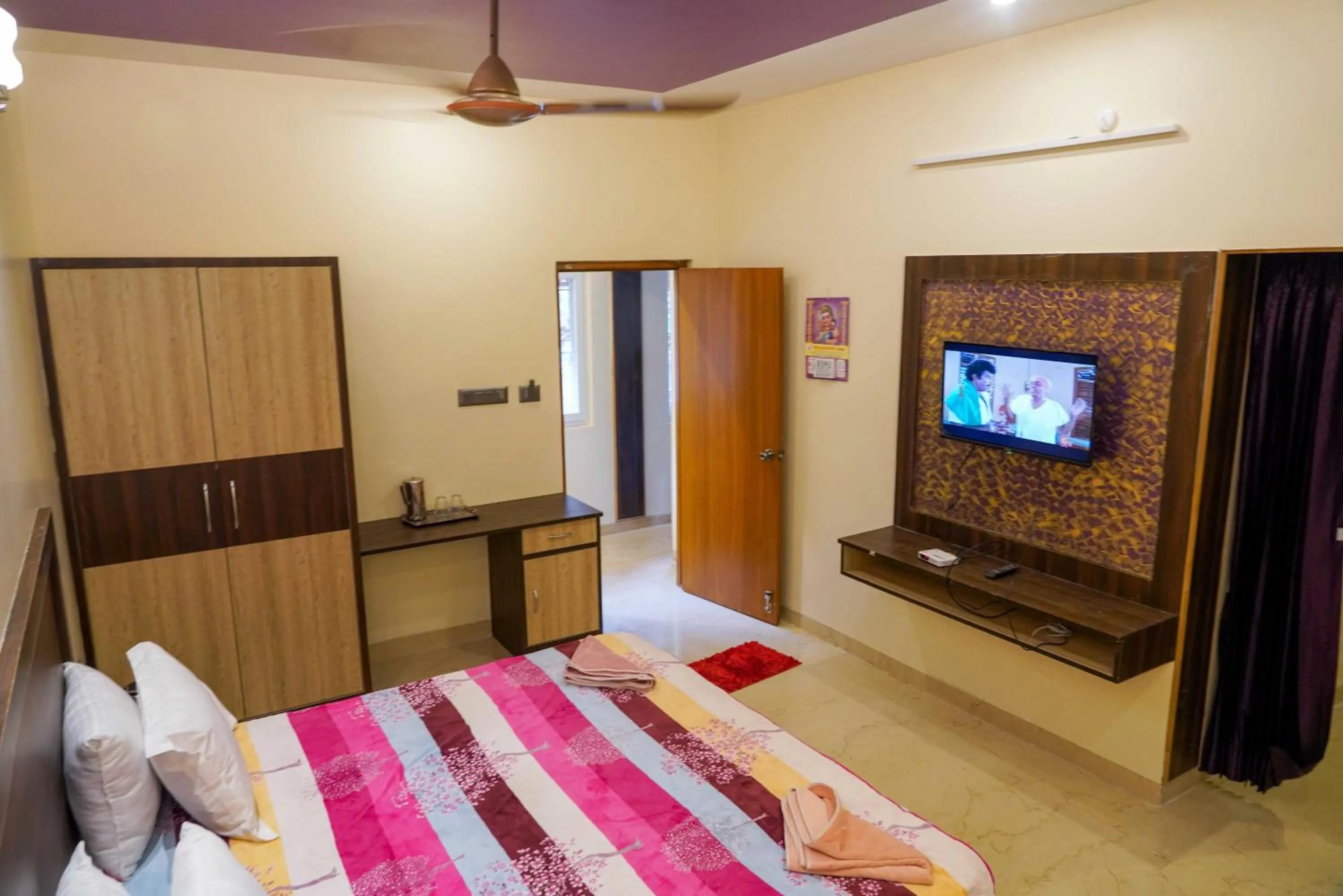 Bed in Bhavan Resorts