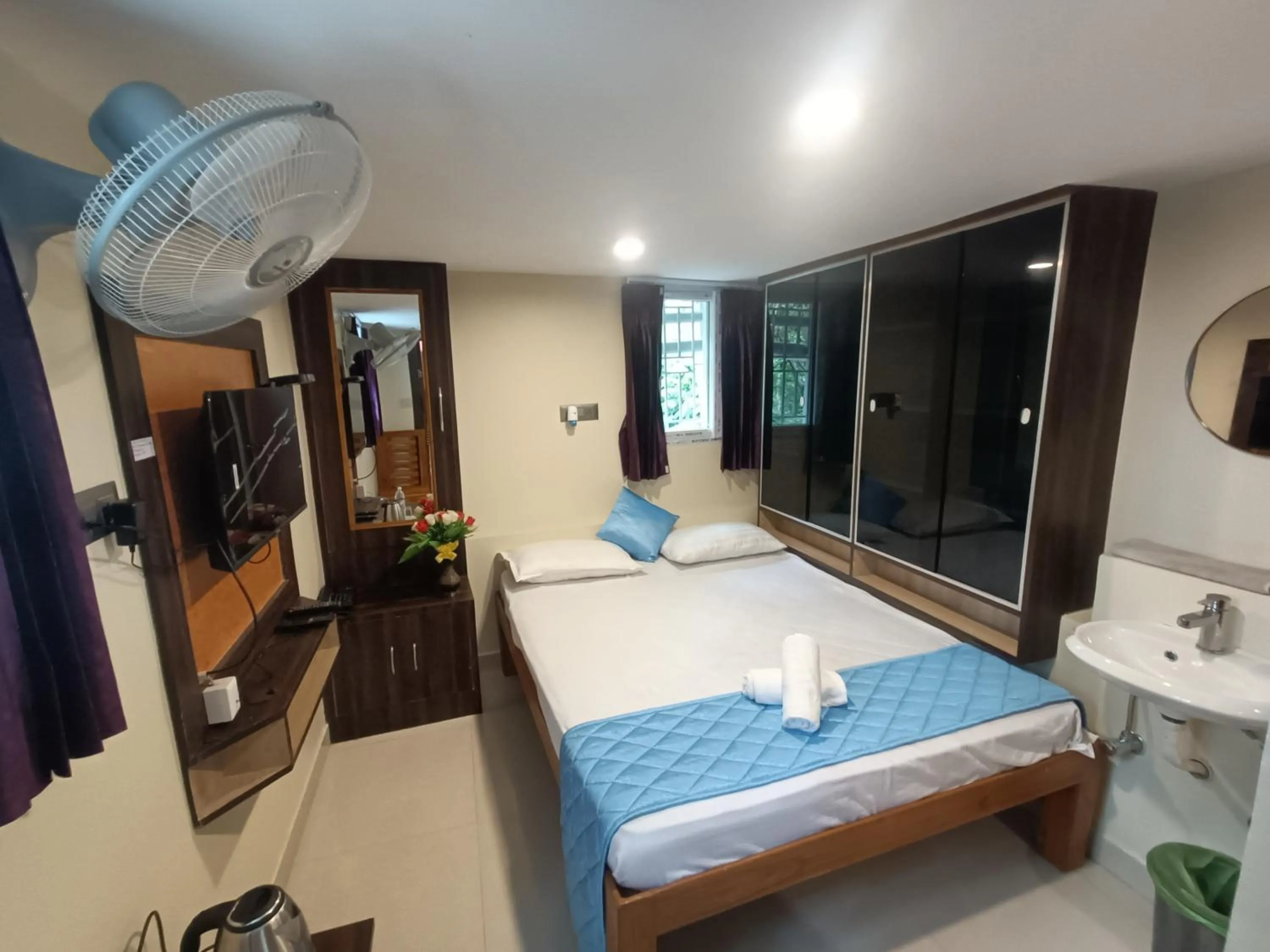 Bed in Bhavan Resorts