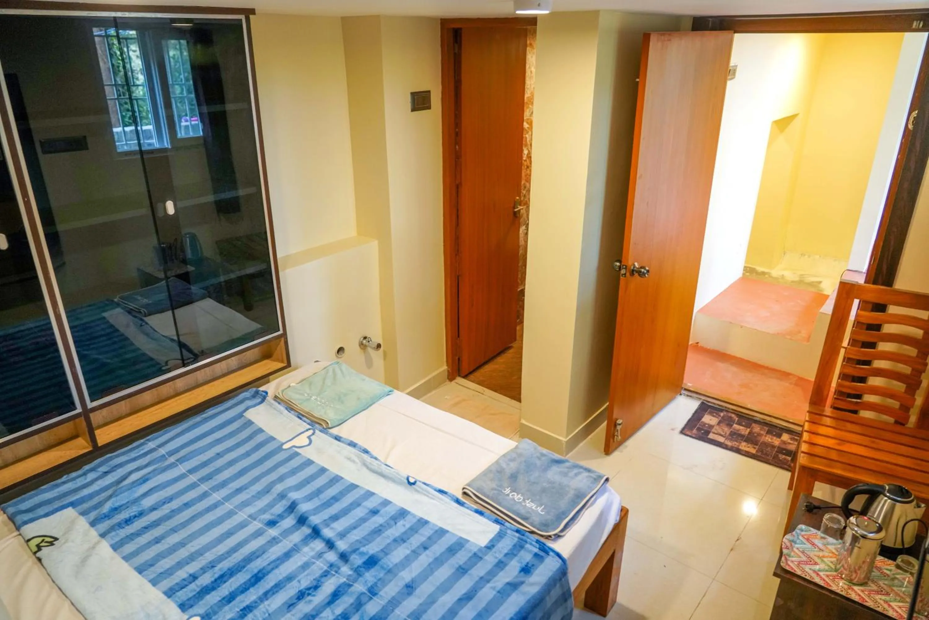 Bed in Bhavan Resorts