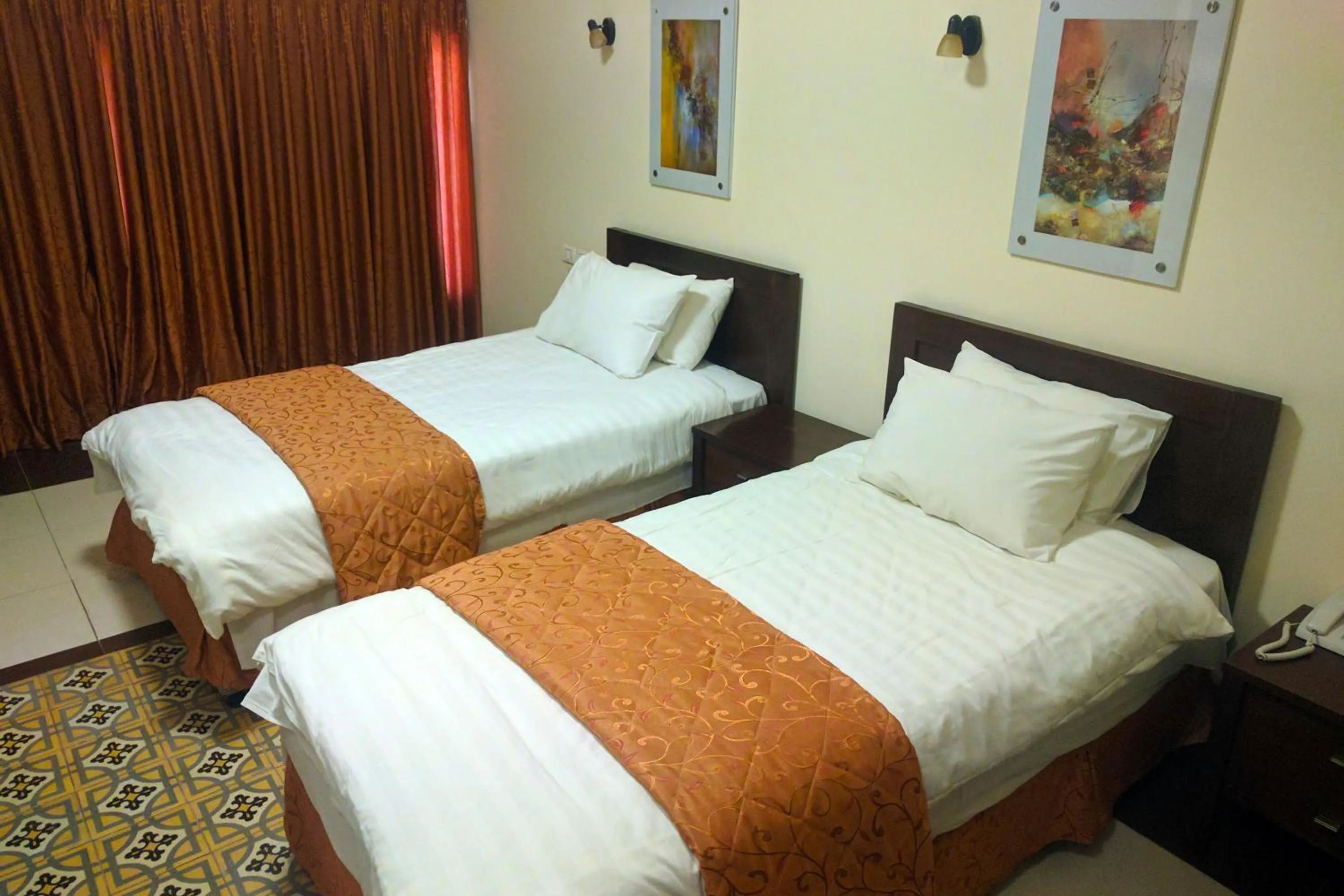 Bed in Alhambra Palace Hotel Suites - Ramallah