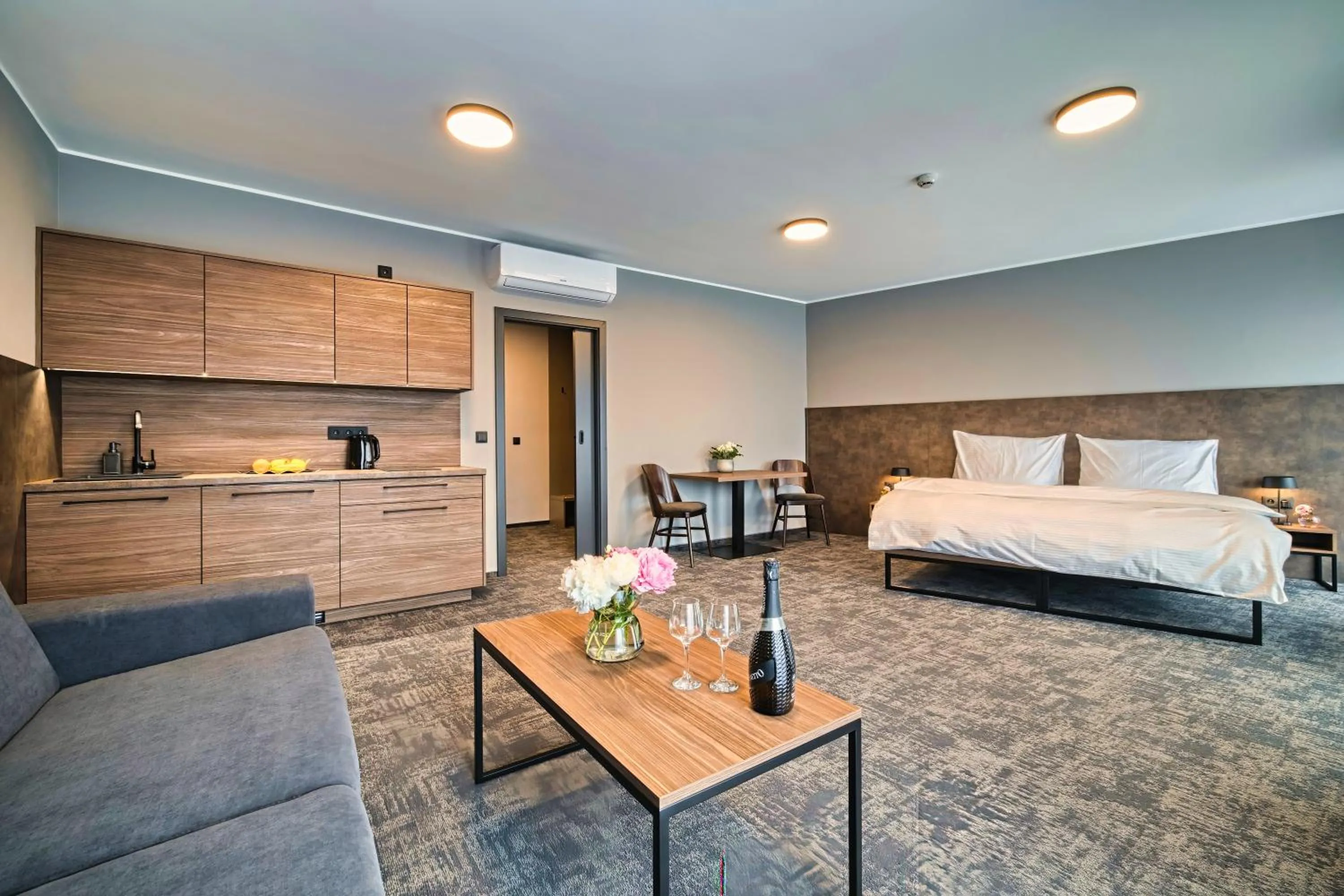 Living room, Bed in ABA Apartments