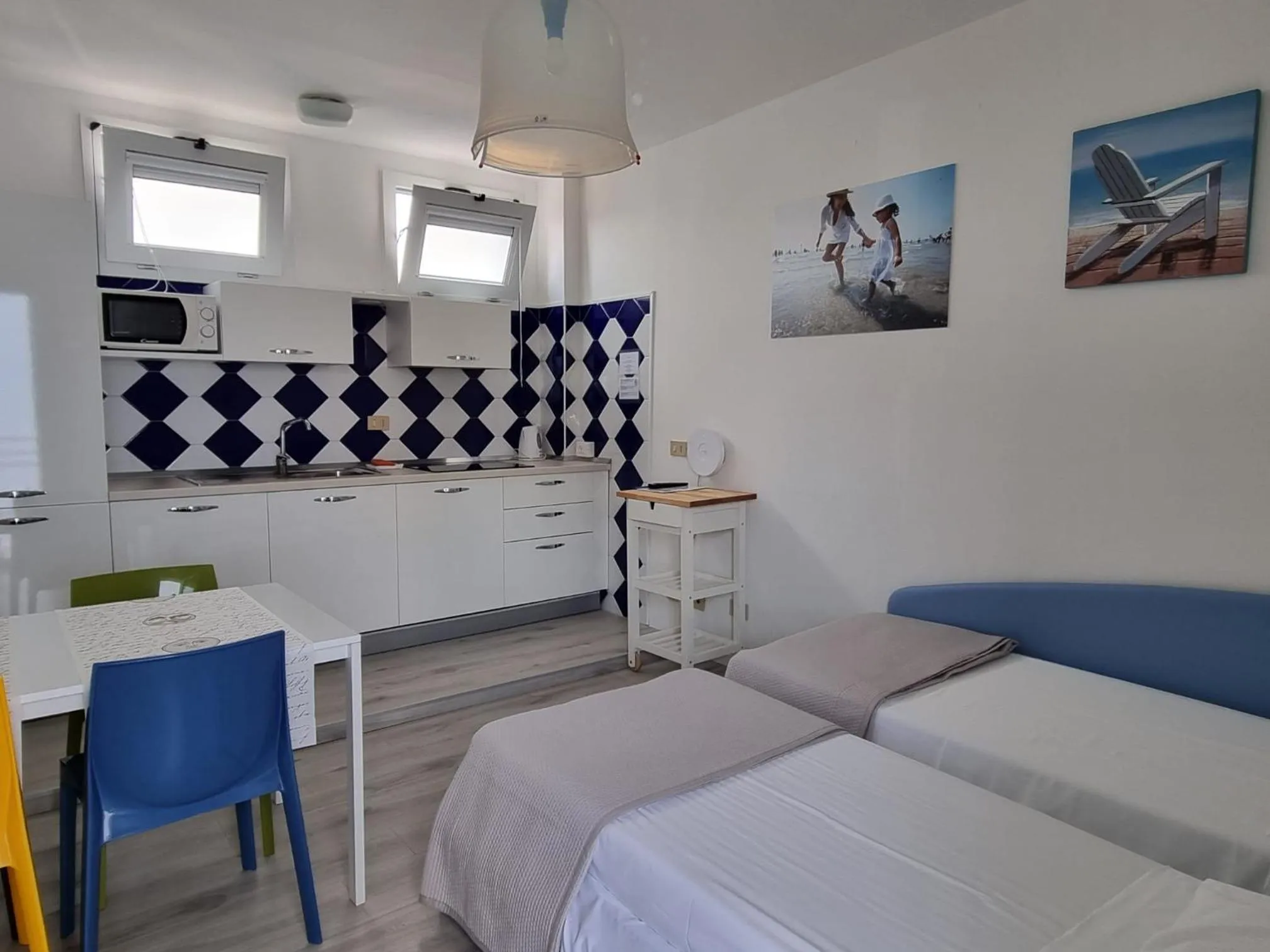 Kitchen or kitchenette, Bed in Appart-Hotel Holiday
