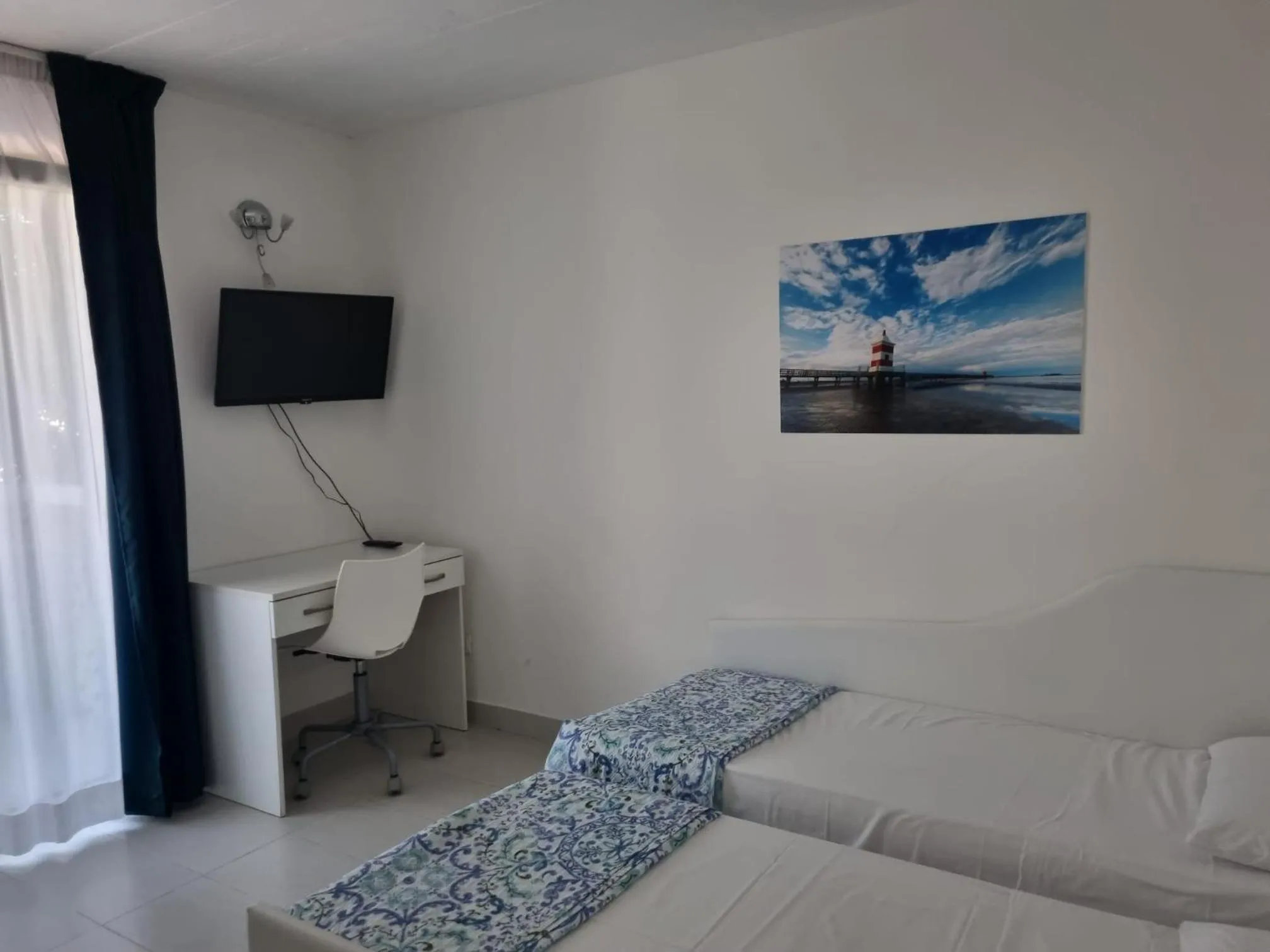 Bed in Appart-Hotel Holiday