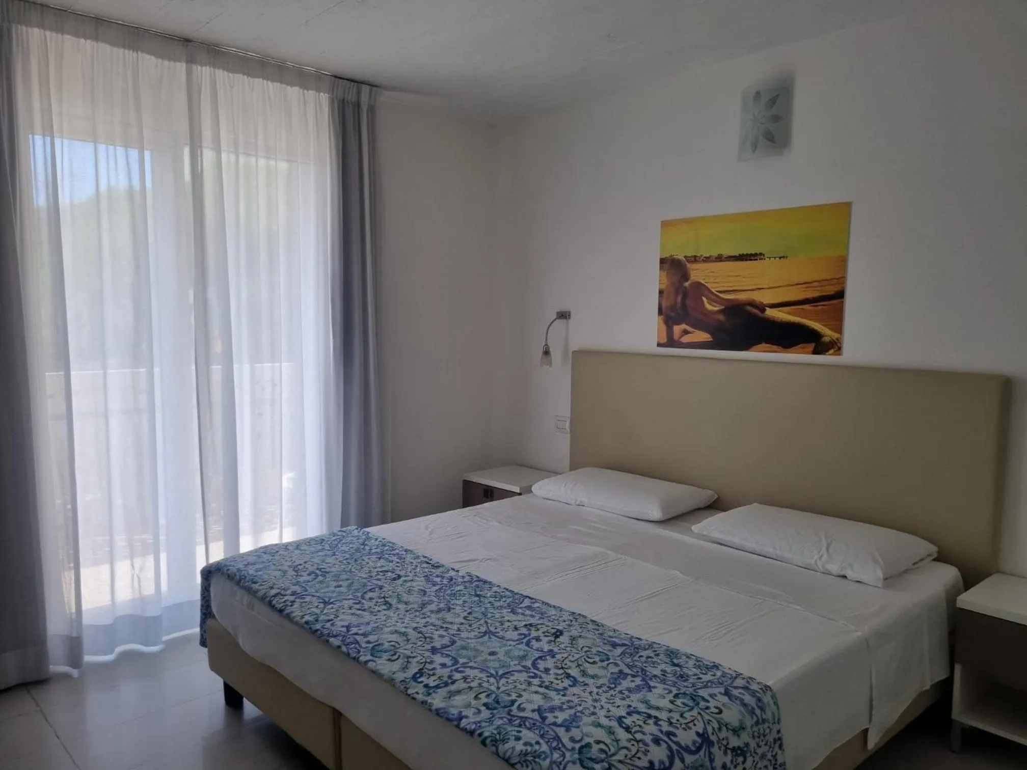 Bed in Appart-Hotel Holiday