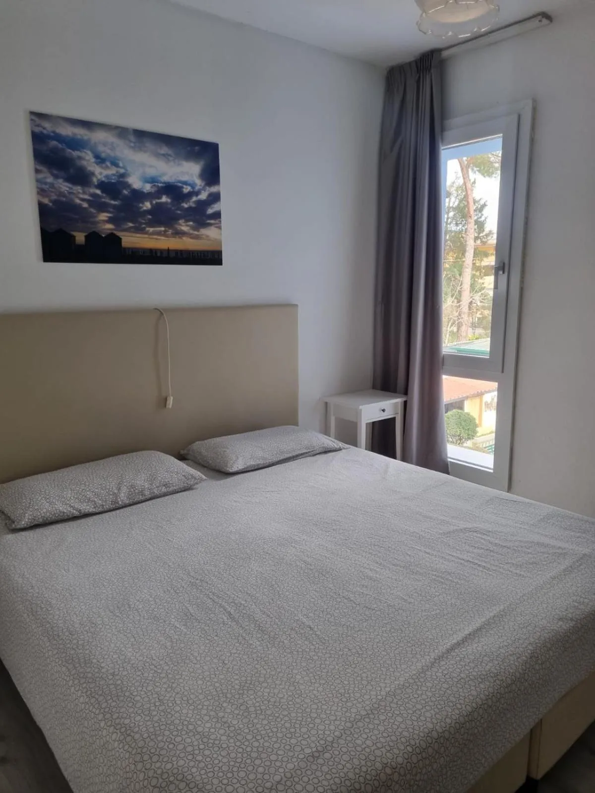 Bed in Appart-Hotel Holiday