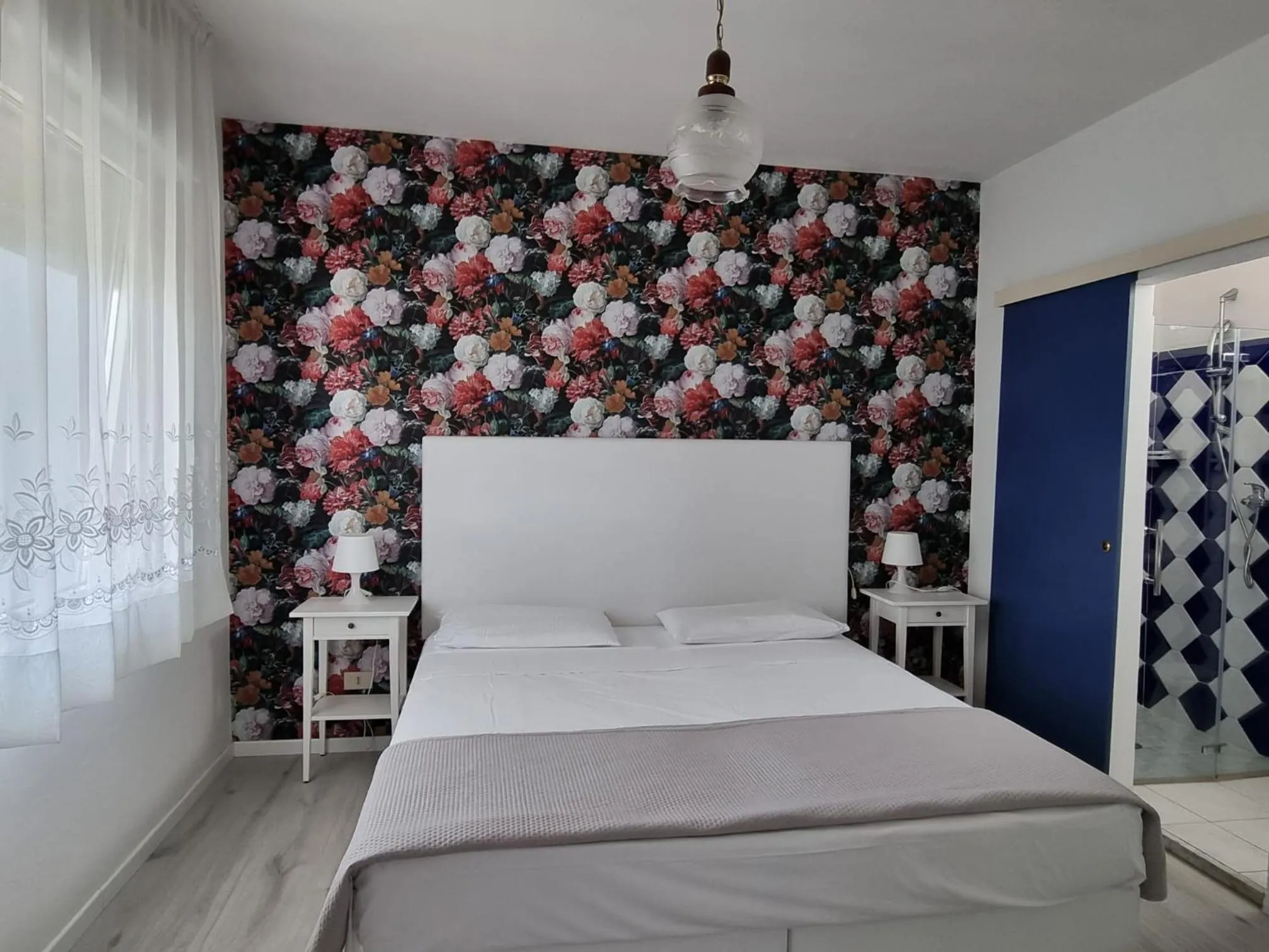 Bed in Appart-Hotel Holiday