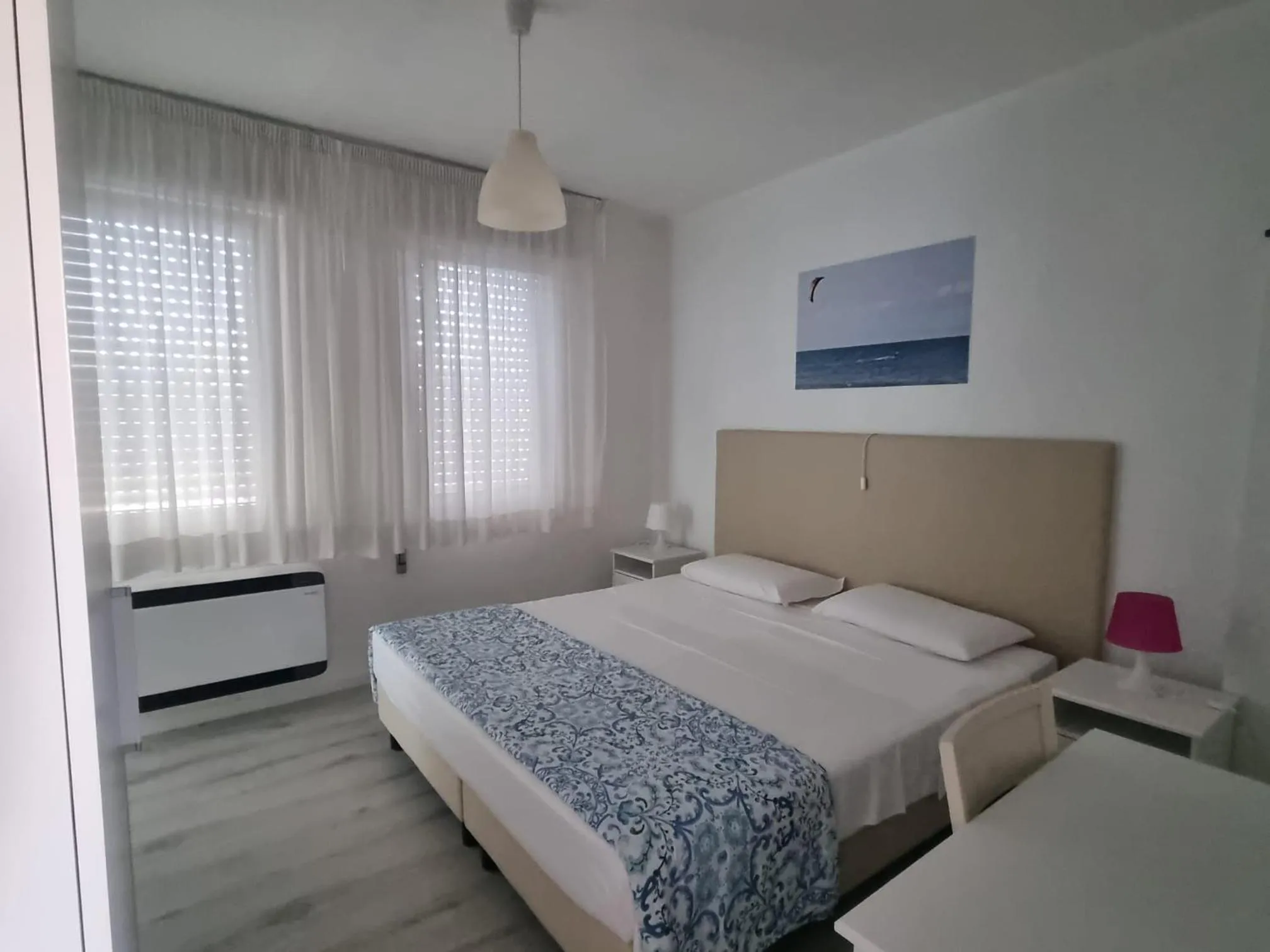 Bed in Appart-Hotel Holiday