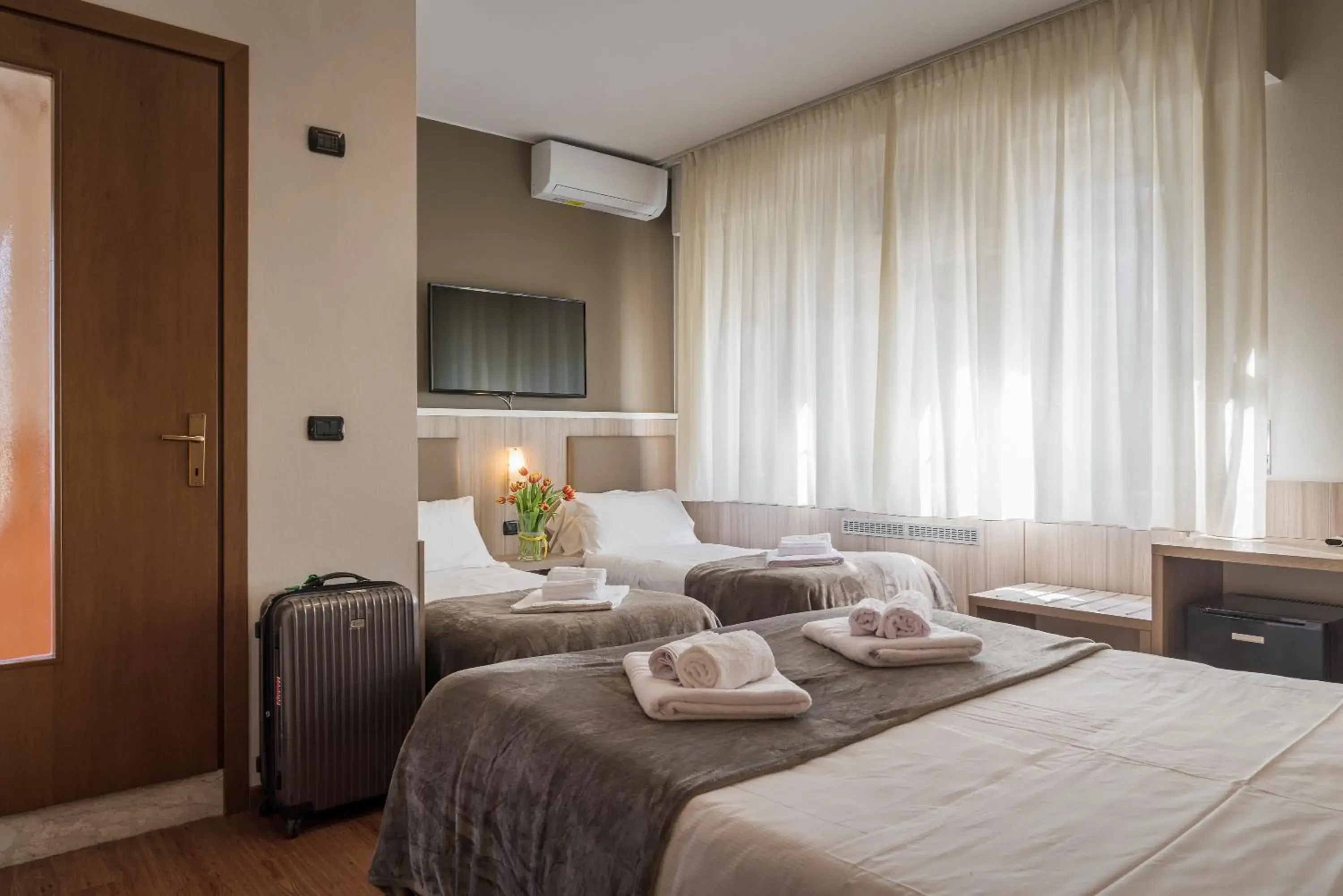 Classic Quadruple Room in Hotel Gardenia Sirmione Classic Quadruple Room in Hotel Gardenia Sirmione