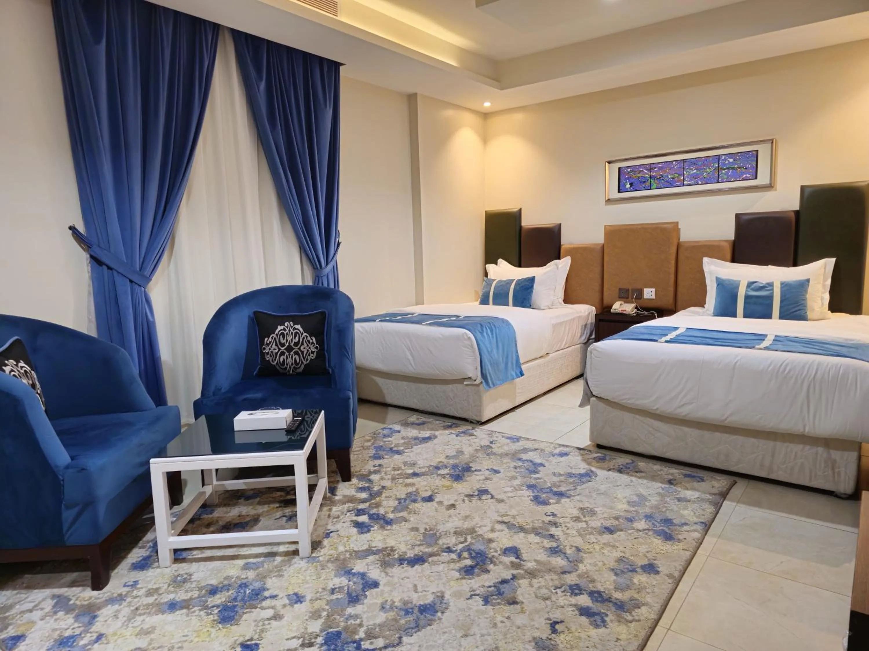 Seating area, Bed in Royal Boutique Hotel