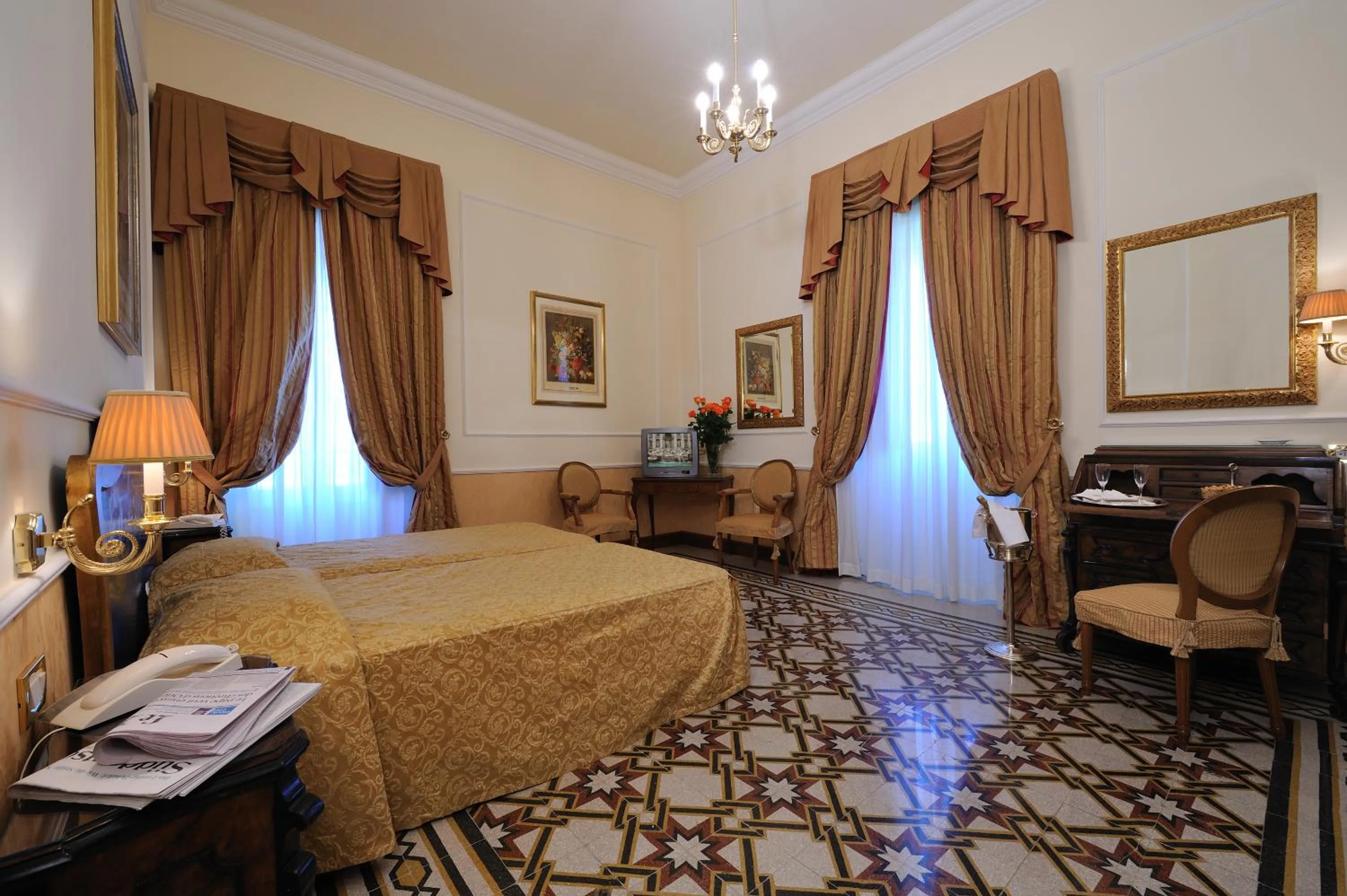 Bed in Hotel Giulio Cesare