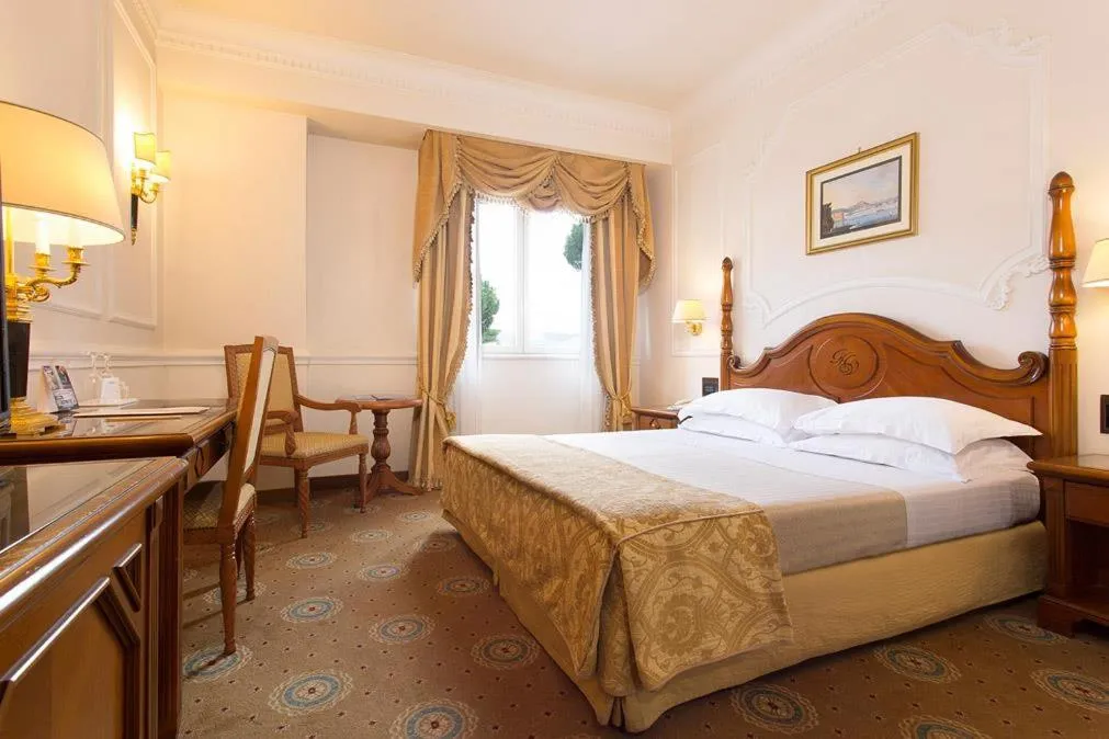 Bed in Grand Hotel Vanvitelli