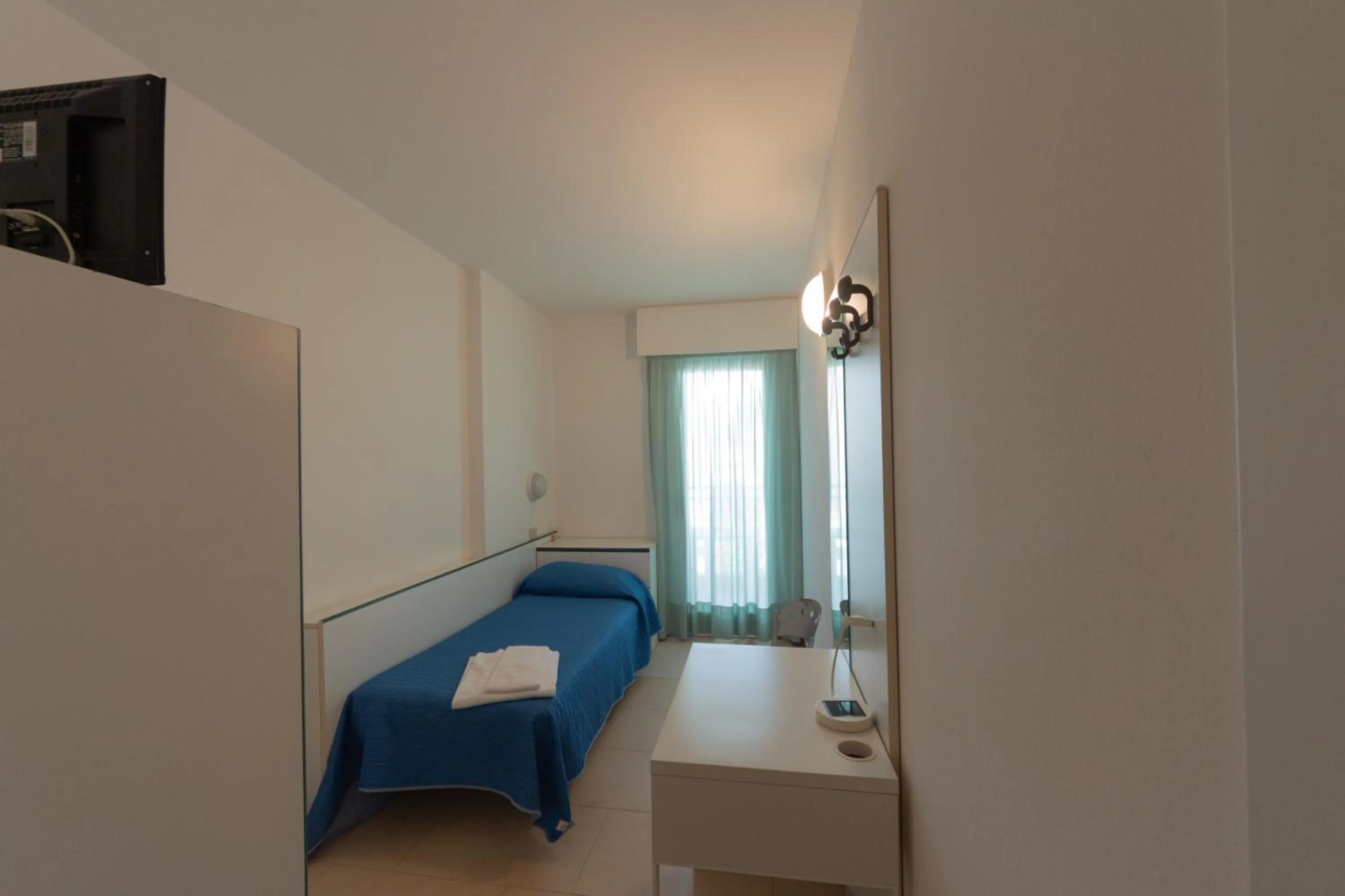 Bedroom in Hotel Ambra