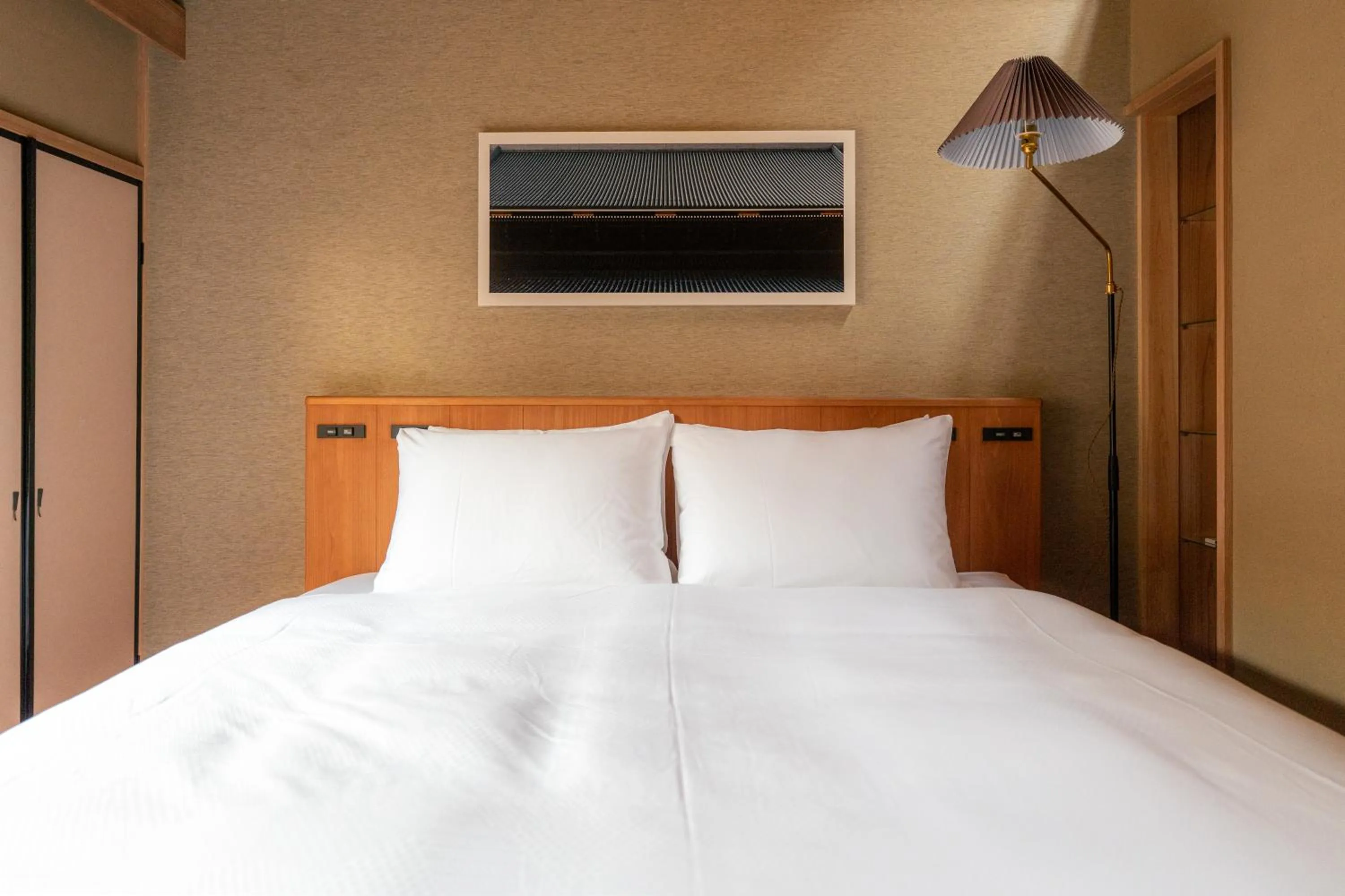 Bed in Genji Kyoto, a Member of Design Hotels