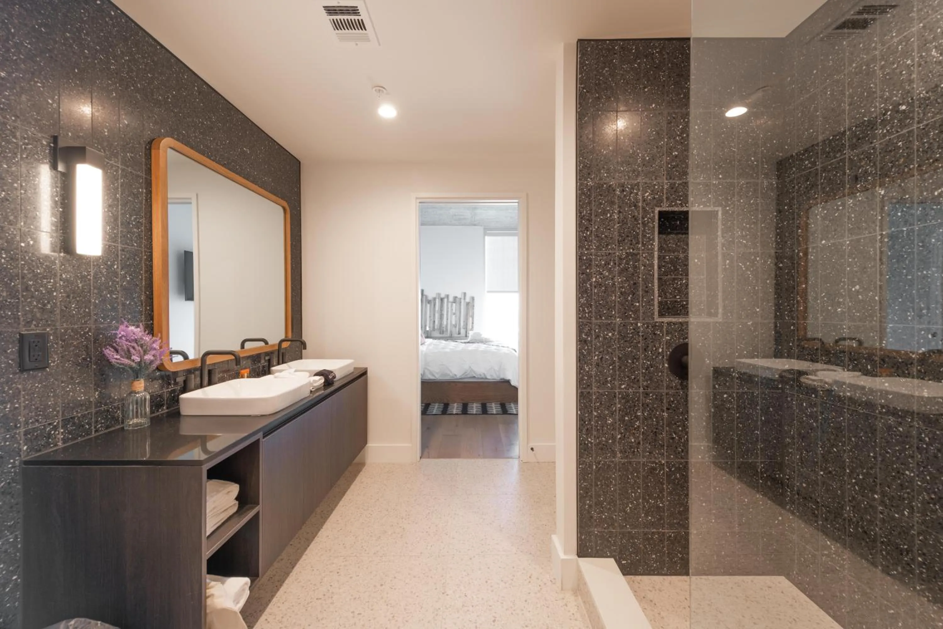 Bathroom in Upscale Rainey St Condo Homes - Peloton, gym, rooftop pool, wifi included
