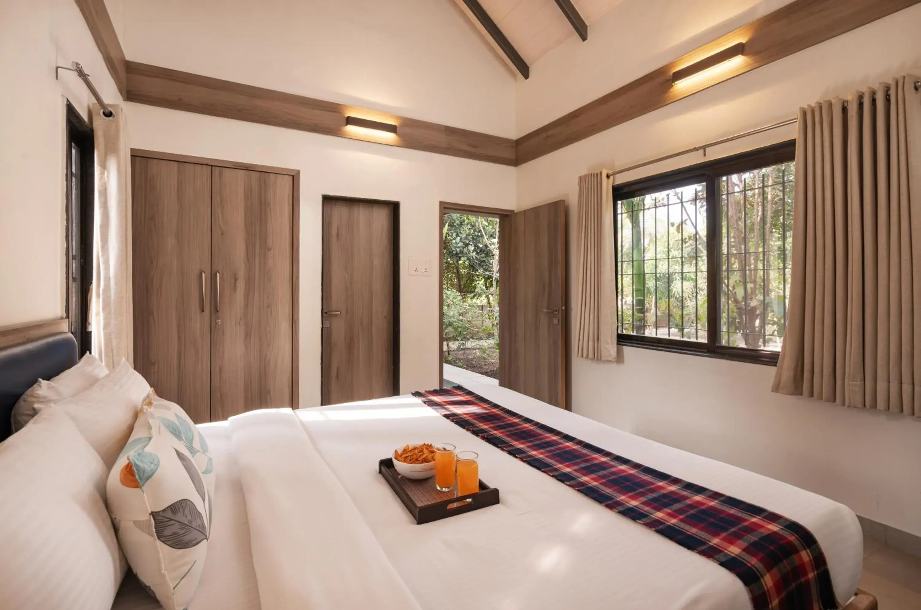 Bed in SaffronStays Eden - 3BR vineyard-side pool villa with jacuzzi, farm dining, stargazing deck & lawns for celebrations Bed in SaffronStays Eden - 3BR vineyard-side pool villa with jacuzzi, farm dining, stargazing deck & lawns for celebrations