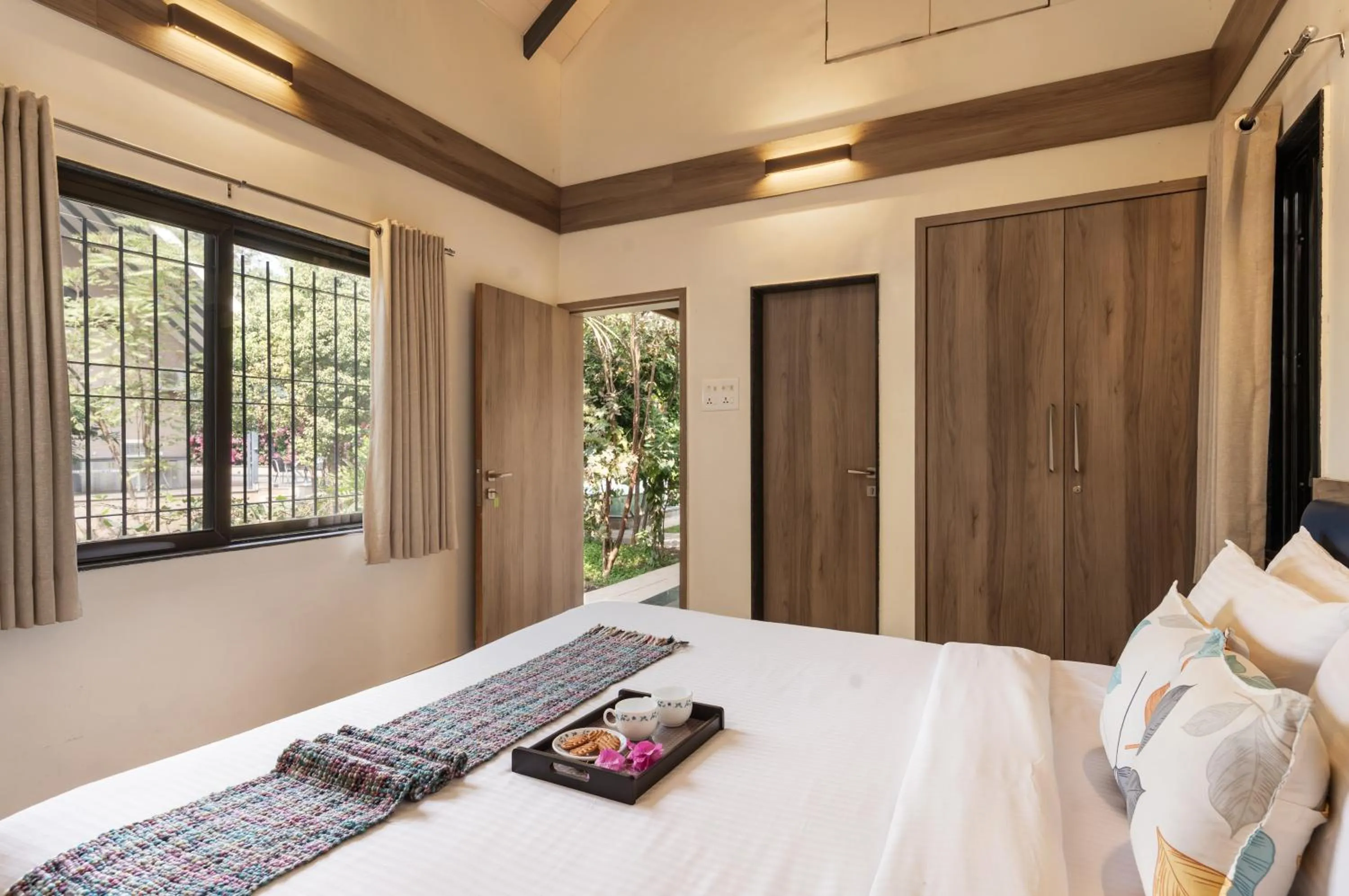 Bed in SaffronStays Eden - 3BR vineyard-side pool villa with jacuzzi, farm dining, stargazing deck & lawns for celebrations