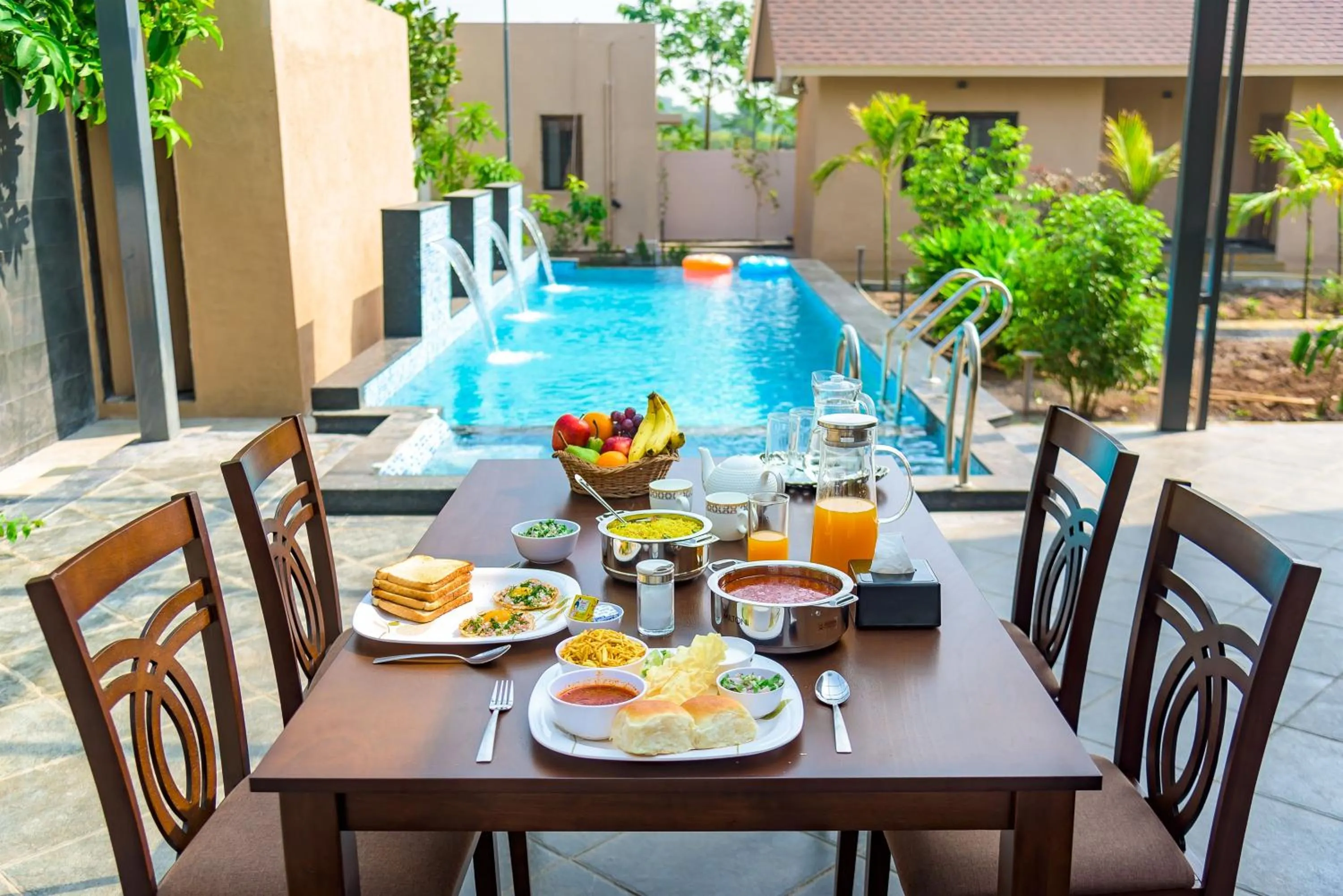 Patio in SaffronStays Eden - 3BR vineyard-side pool villa with jacuzzi, farm dining, stargazing deck & lawns for celebrations