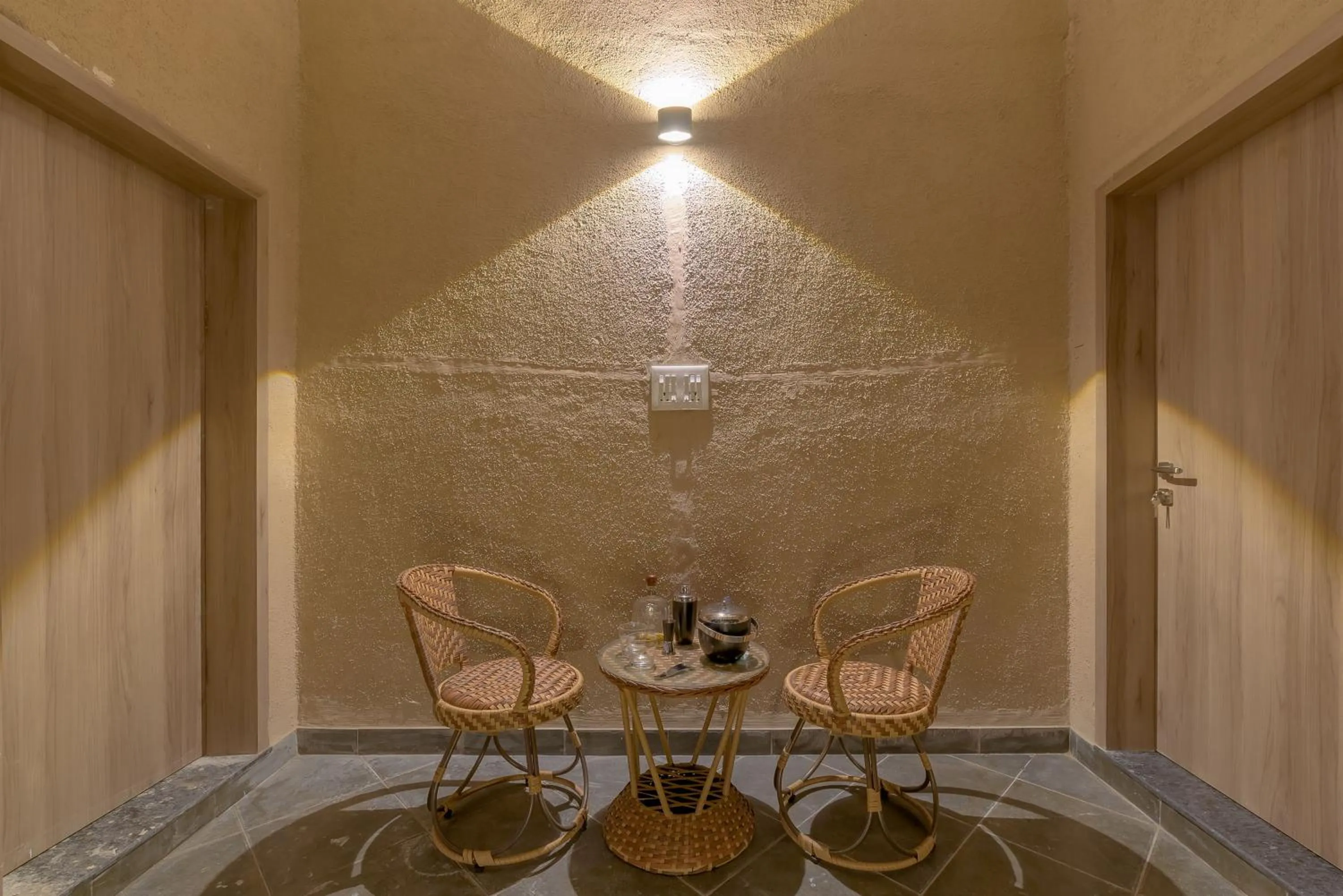 Seating area in SaffronStays Eden - 3BR vineyard-side pool villa with jacuzzi, farm dining, stargazing deck & lawns for celebrations