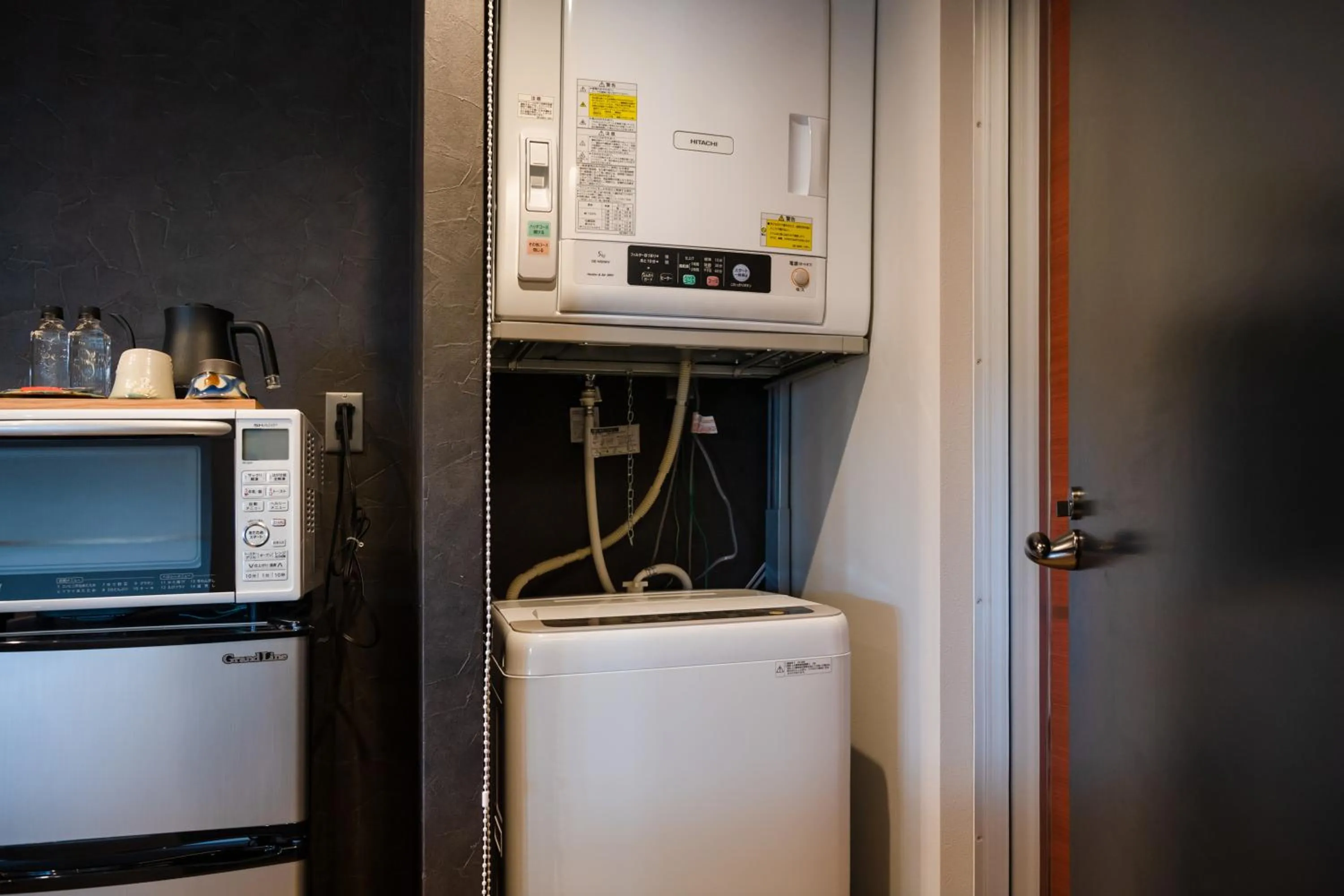 washing machine in D-and Stay 5 Resort Okinawa