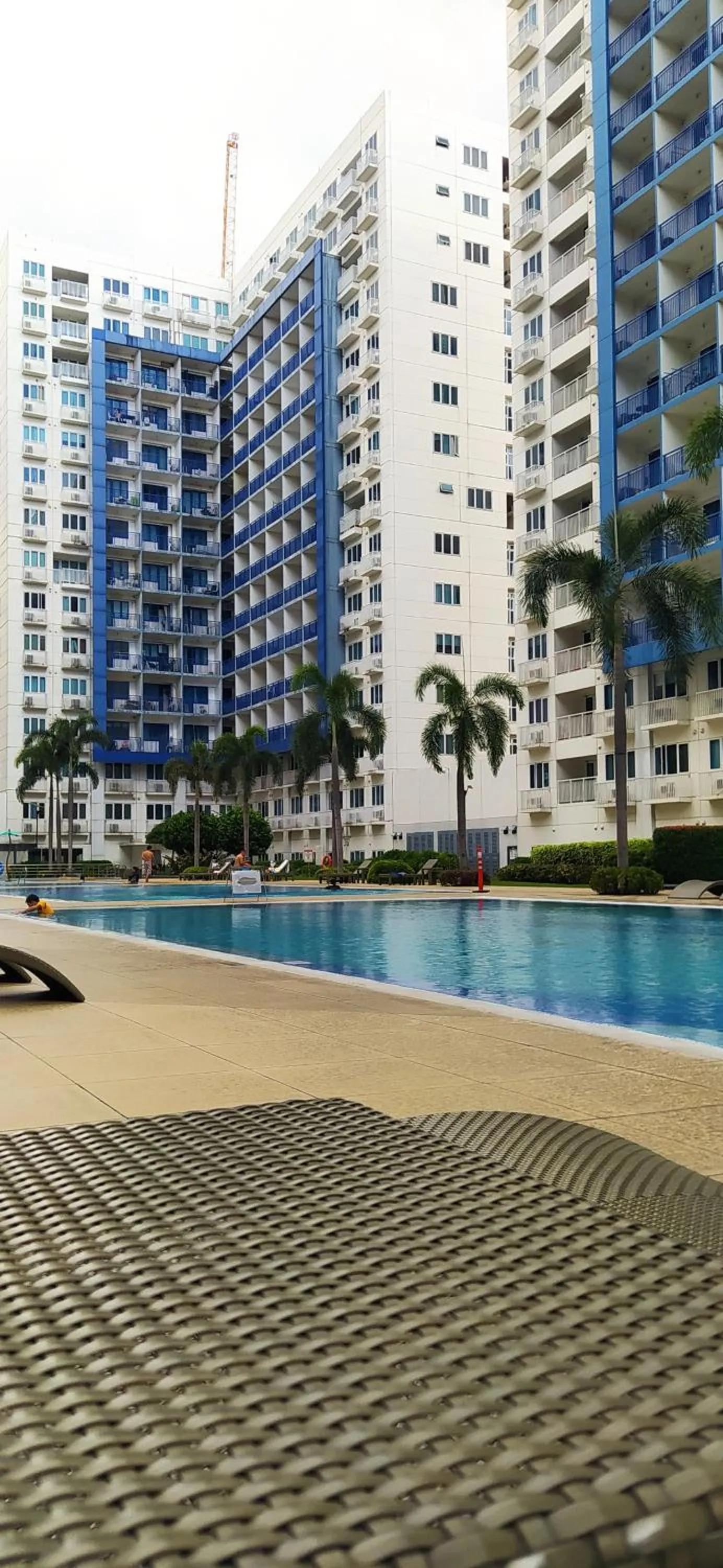Swimming pool in Sea Residences Mall of Asia by Jermel