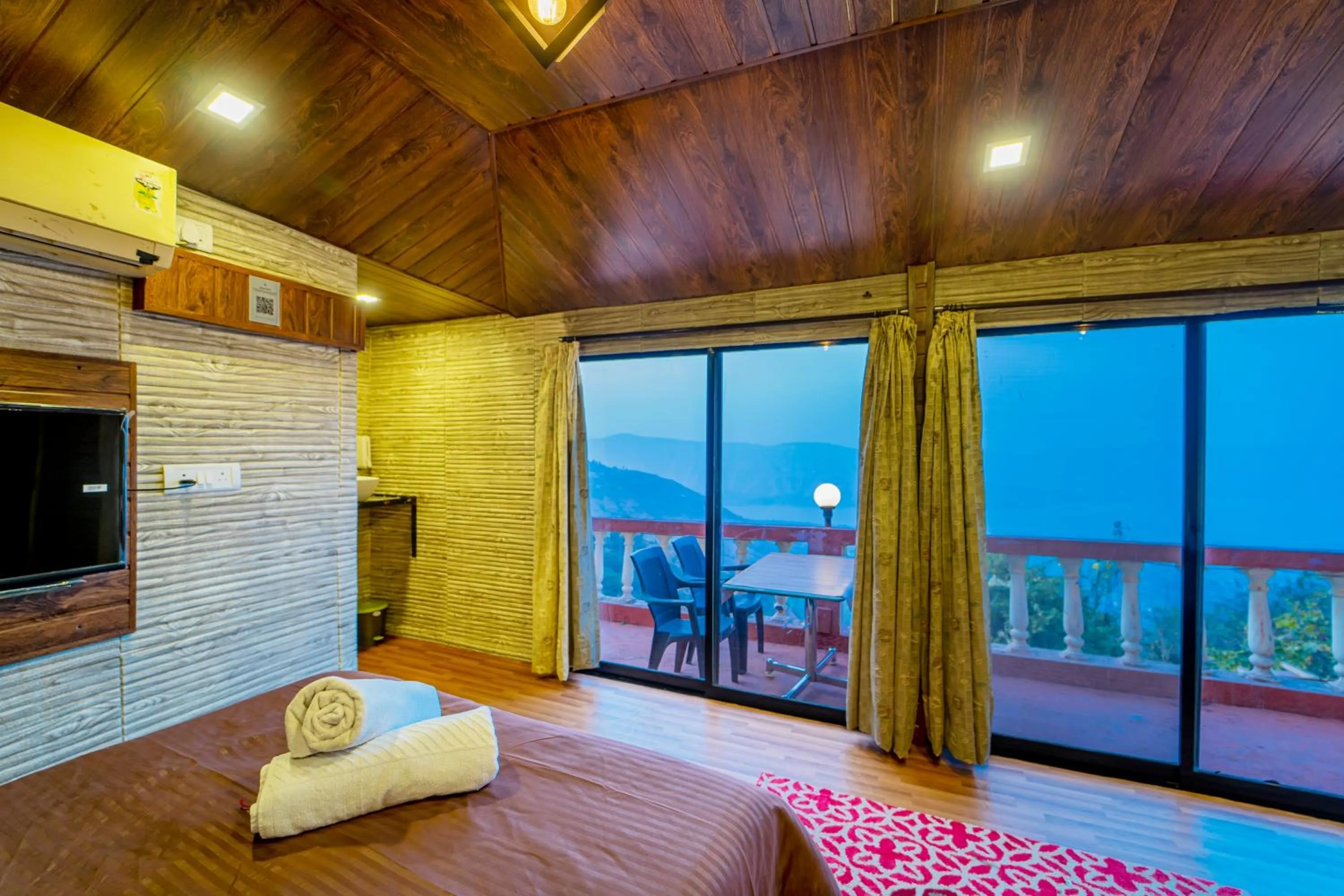 Bed in Sharayu Holidays Valley View